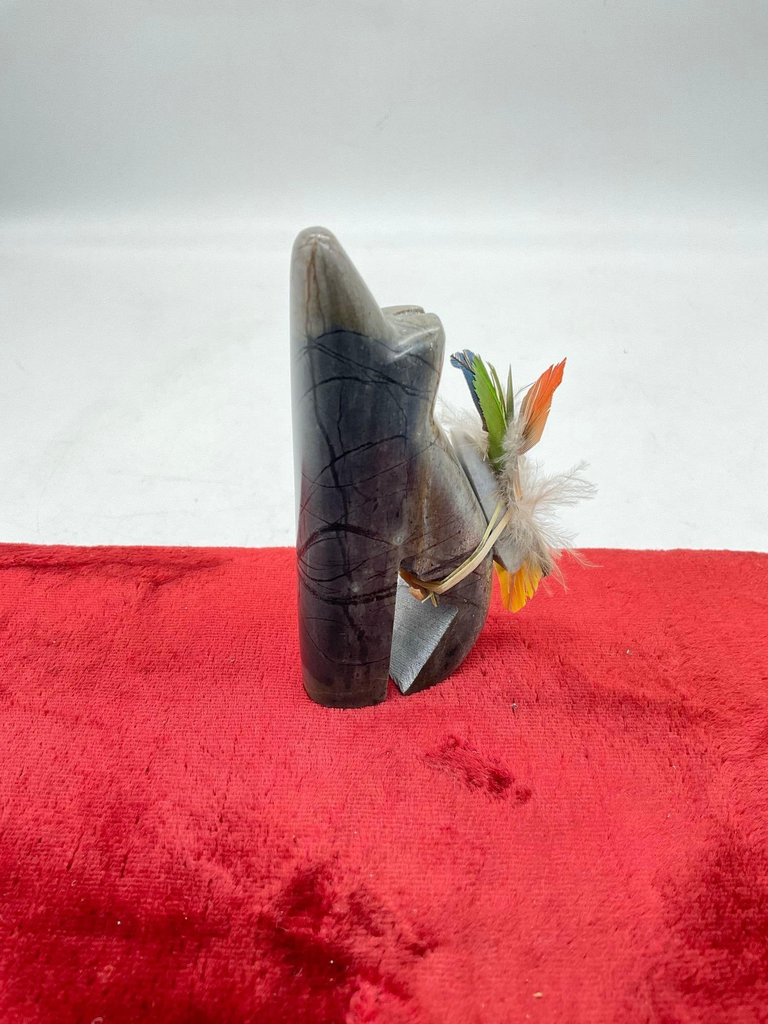 Vintage hand carved Zuni howling wolf fetish figure w/arrowhead, turquoise and feather: Signed VA on bottom J-5010 approx 3" tall 