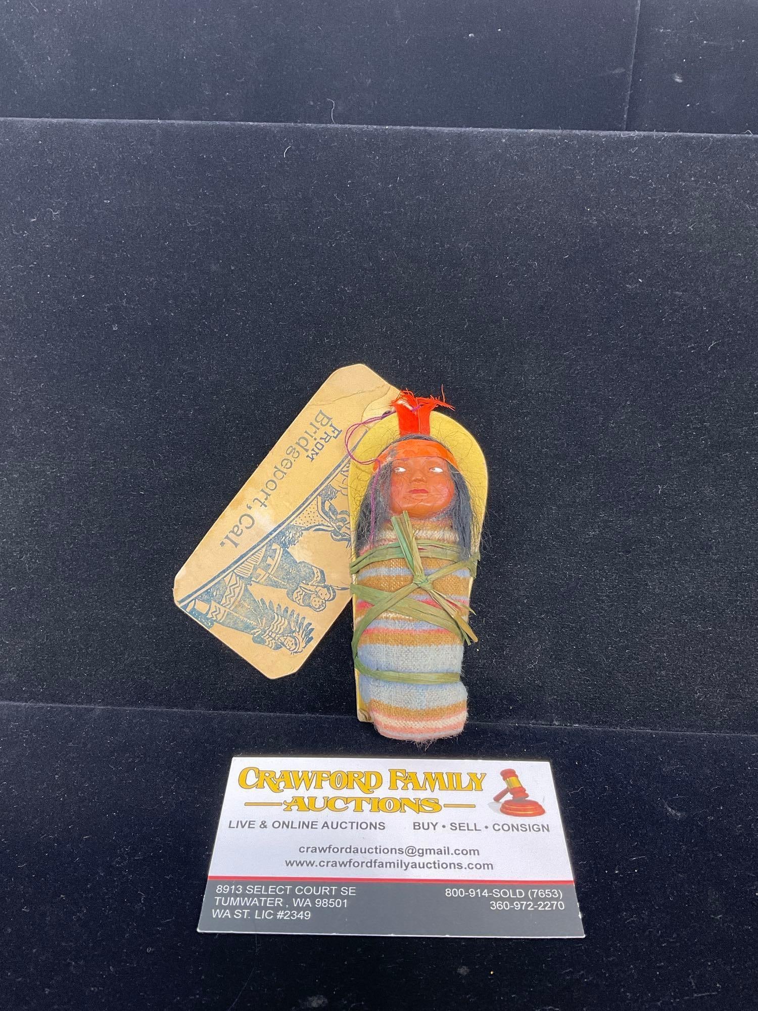 Early 20th Century Native American Papoose doll, 5h x 3w x 3d inches w/ Tag on it: Appears to be in good shape. The piece measures approx 5h x 3w x 3d inches. See pics. E-5320
