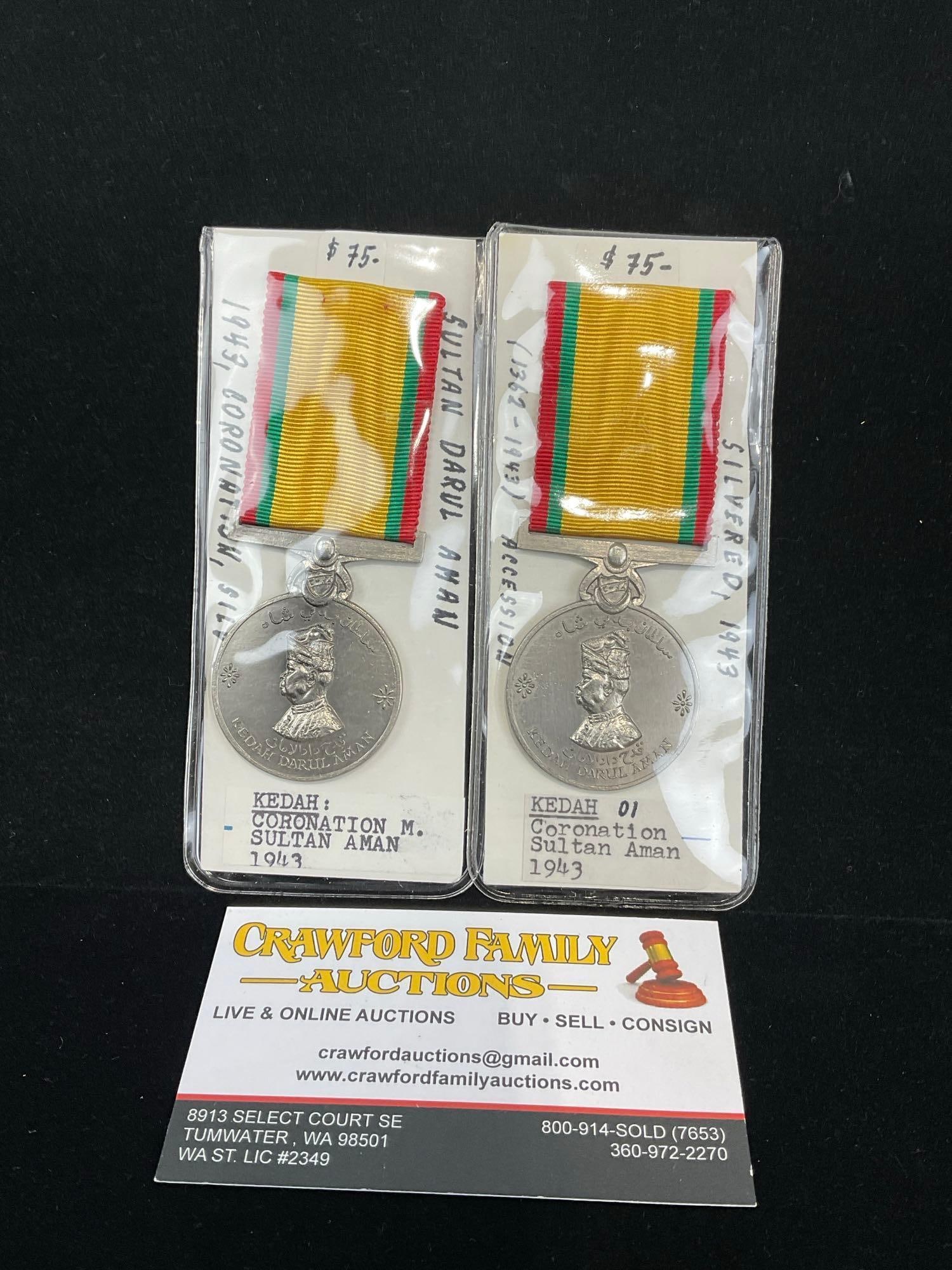 Pair of Kedah Medals, Coronation Medal Sultan Aman 1943, Yellow/Red/Green Ribbons: All from a single collection, these are briefly described on the tag and were kept in a display. They measure approx 6h x 3w x 2d inches. See pics. E-5300 