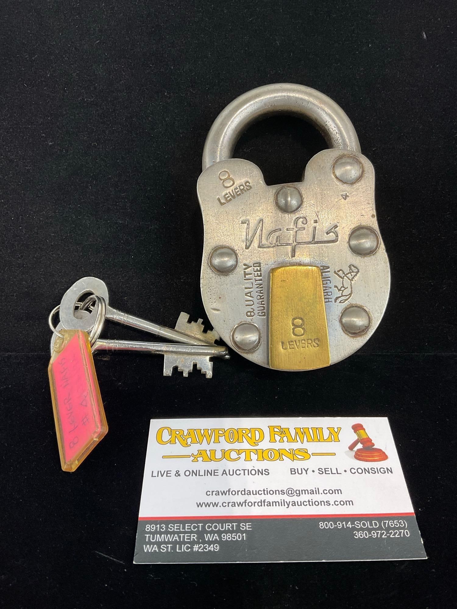 Antique Nafis Indian Padlock, w/ 2 Keys, 6 Levers, made in Aligarh, Steel & Brass, 6x4x3 in: Appears to be in good shape. The piece measures approx 6h x 4w x 3d inches. See pics. E-5360