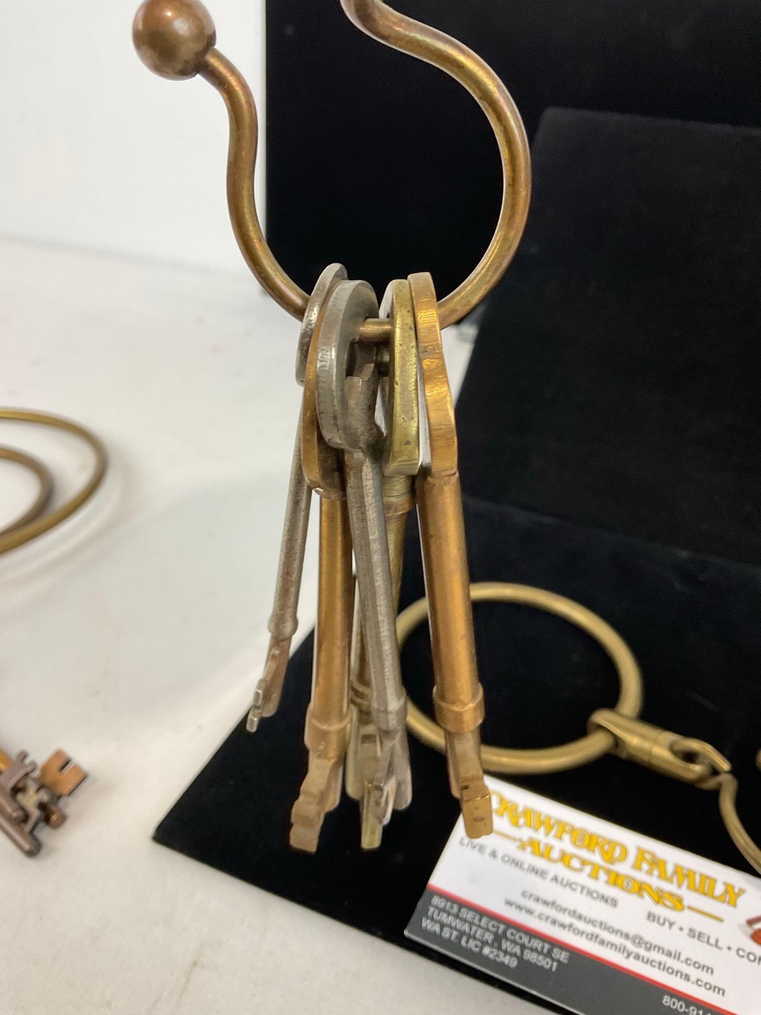 Collection of 11 Skeleton Keys on 4 Brass Rings, Articulated Rings, 9h x 7w x 3d inches - 4