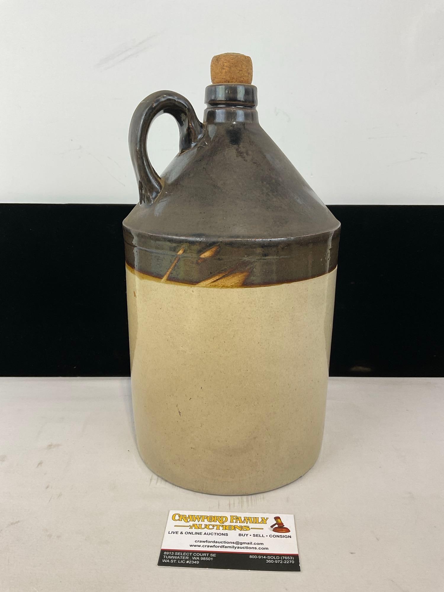 Antique Dark Brown & Beige Glazed Stoneware Jug, w/Cork & Loop Handle, 13h x 8w x 8d inches: Similar to the last lot. Appears to be in good shape. The piece measures approx 13h x 8w x 8d inches. See pics. E-5360 