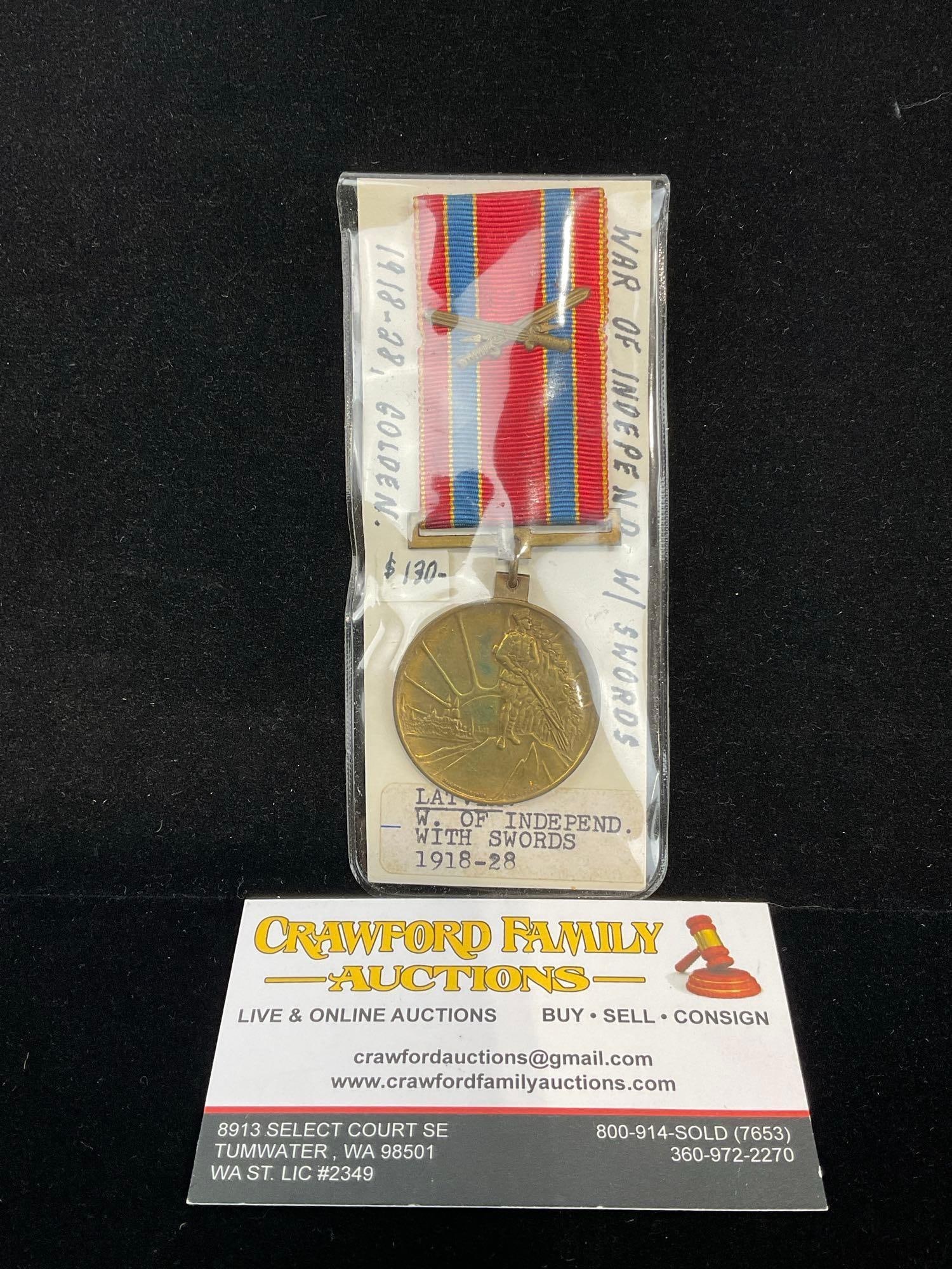 Antique Latvian Medal War of Independence 1918-1928, Bronze w/ Swords, Red/Grey Ribbon: Same medal as 158-159. All from a single collection, these are briefly described on the tag and were kept in a display. They measure approx 6h x 3w x 2d inches. See pics. E-5300 
