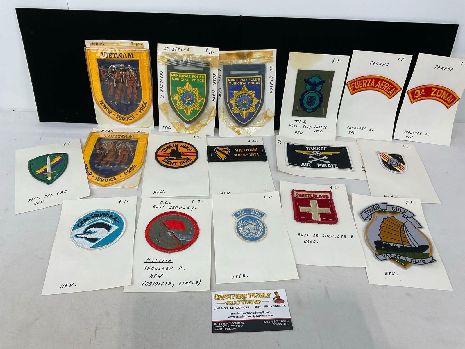 17 Patches, Variety of Army, Mil. Vietnam Era Army & SF, UN, Swiss, SA Municipal Police, & more: All from a single collection, these are briefly described on the tag and were kept in a display. They measure approx 6h x 3w x 2d inches. See pics. E-5300 