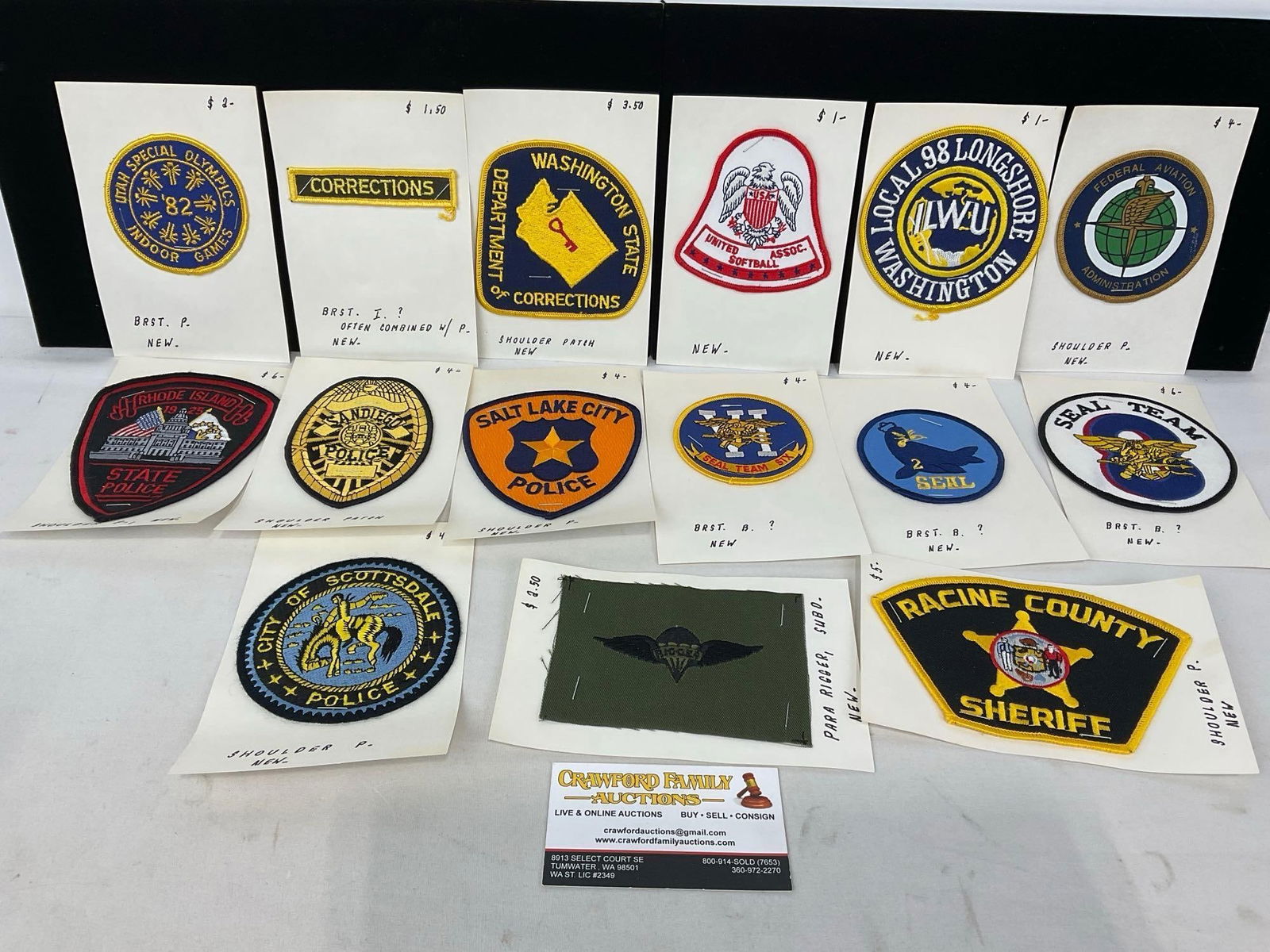 15 Patches, Police, Corrections, FAA, Seal Teams, Para Rigger, Union, Special Olympics & more: All from a single collection, these are briefly described on the tag and were kept in a display. They measure approx 6h x 3w x 2d inches. See pics. E-5300 