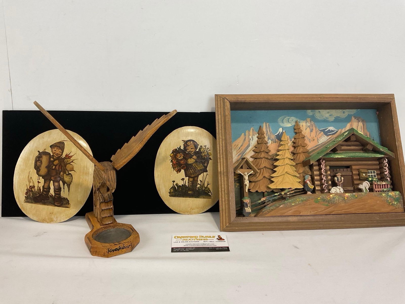Pair of Hummel Chalkware Wall Hangings, Krakow Wooden Ashtray, Swiss Scene 3D Framed Art: Appears to be in good shape. The piece measures approx 3h x 14w x 11d inches. See pics. E-4710