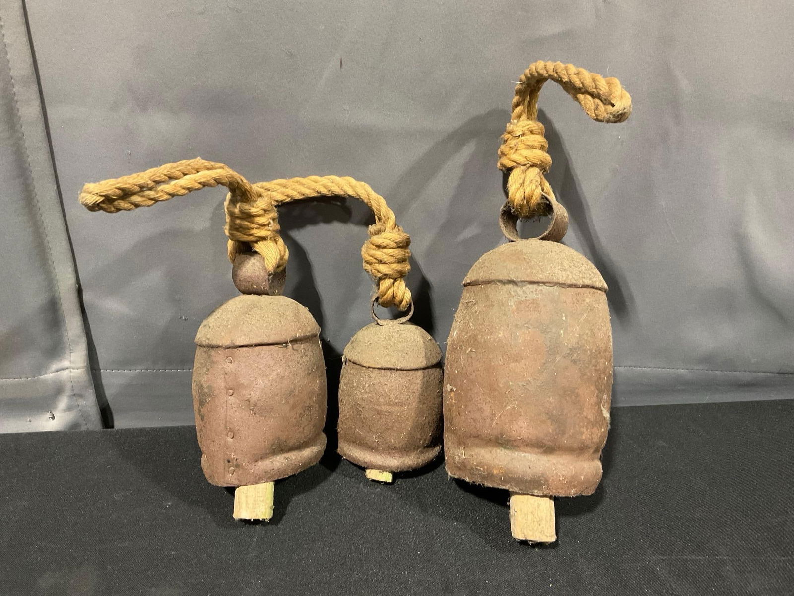 3 Rustic Farmhouse style Cow Bells w/ Wooden Dowel Clappers & Rope for Wall hanging, 13 x 10 x 6 in (1 of 3)