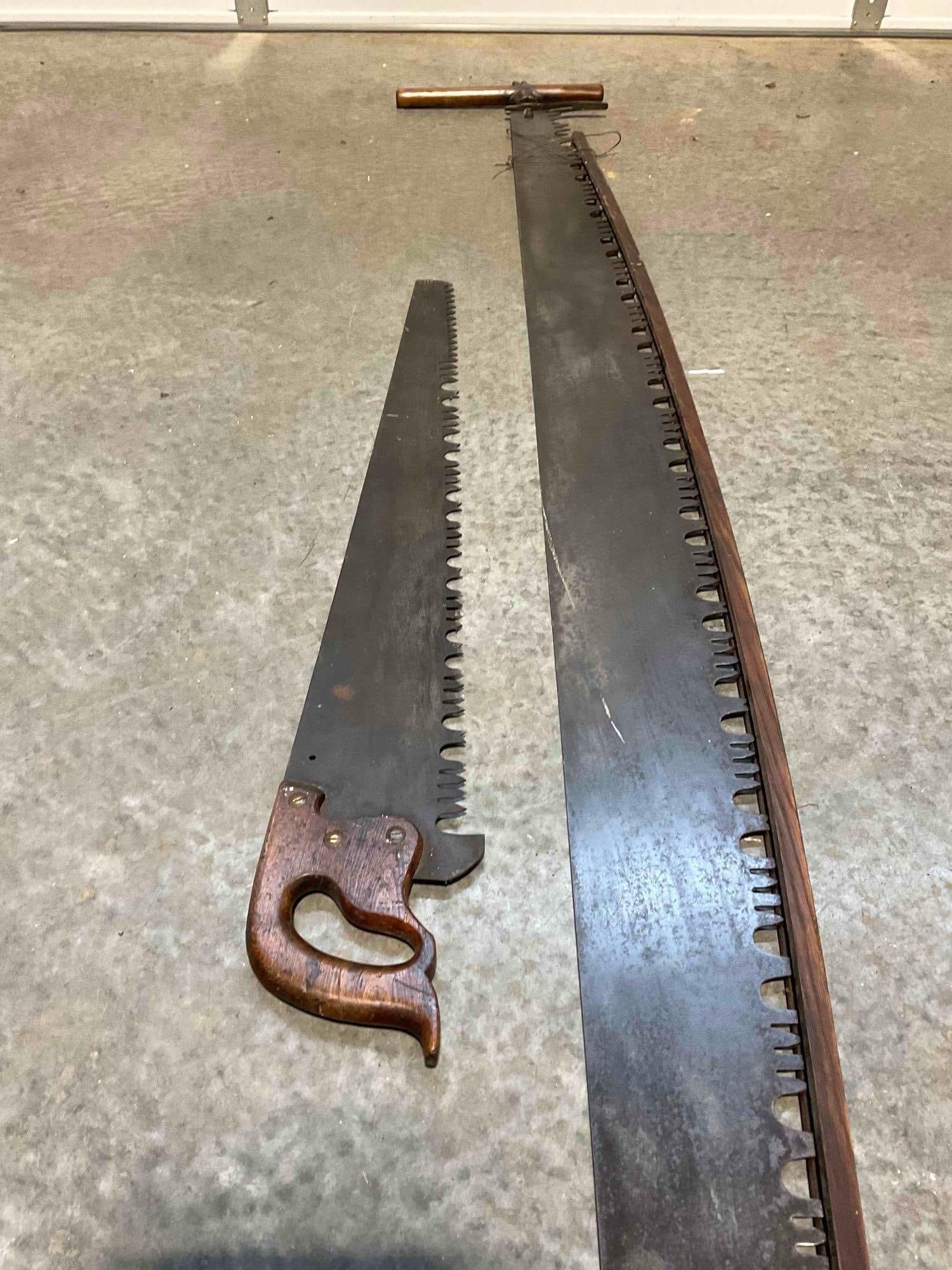A Pair of Antique Cross Cut Lumber Saws a Hand Saw and a Two-Man "Misery Whip" - 2