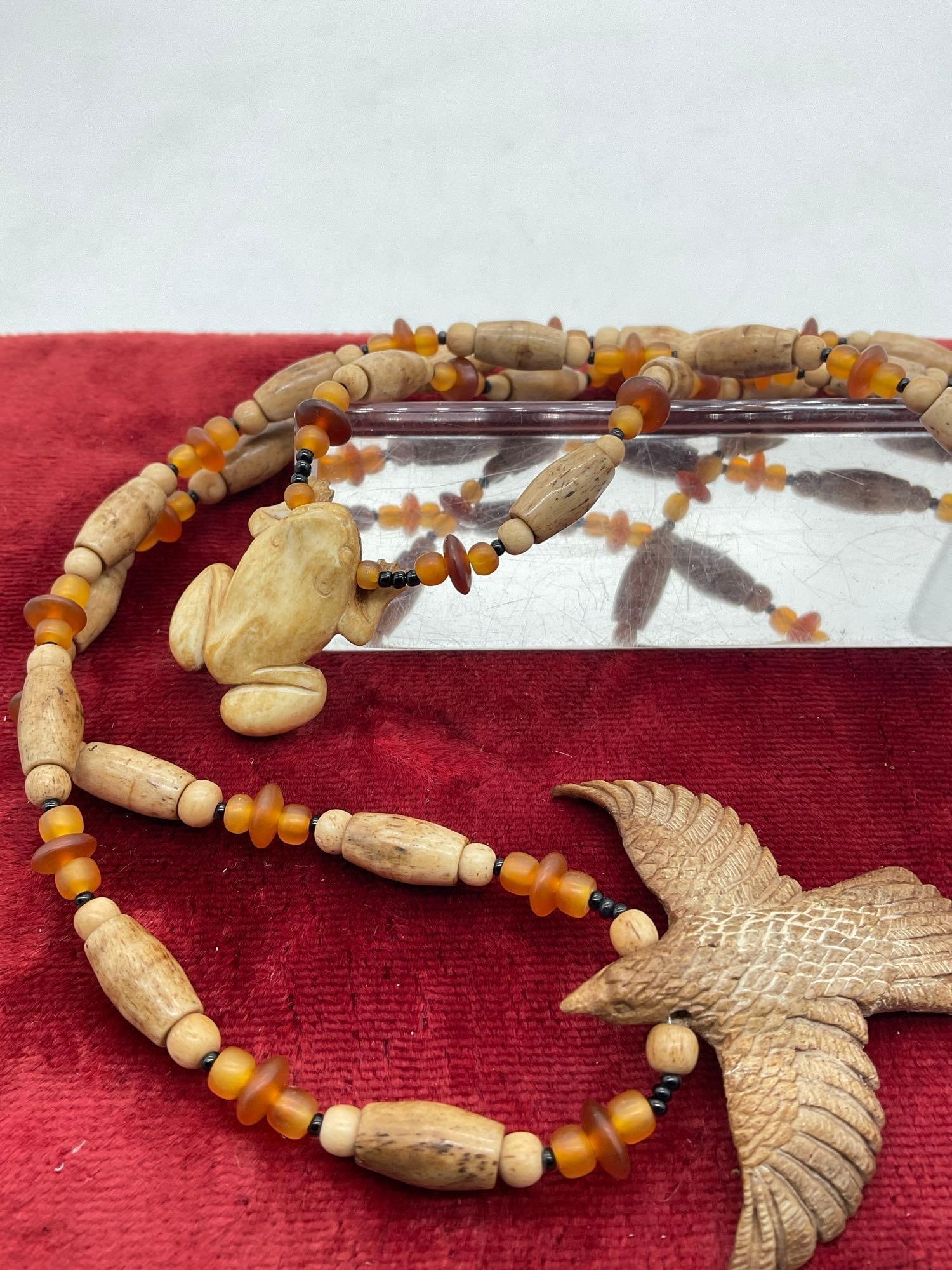 2x vintage Native Hand carved Elk or deer bone Hair pipe Necklace w/ carved Eagle & frog Pendants - 2