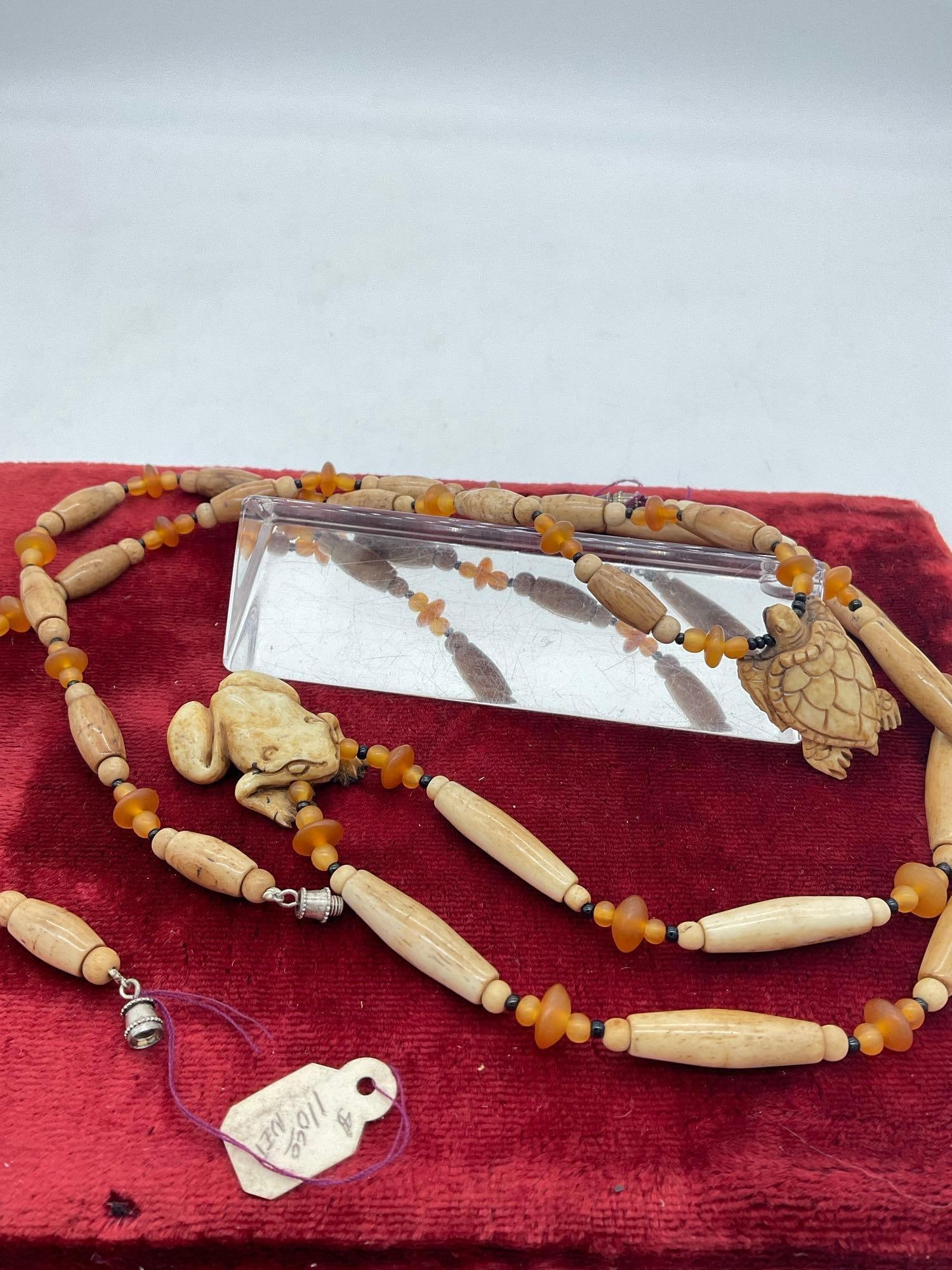 2x vintage Native Hand carved Elk or deer bone Hair pipe Necklace w/ carved Turtle & frog Pendants: c-5320 Each marked at 110.00 each