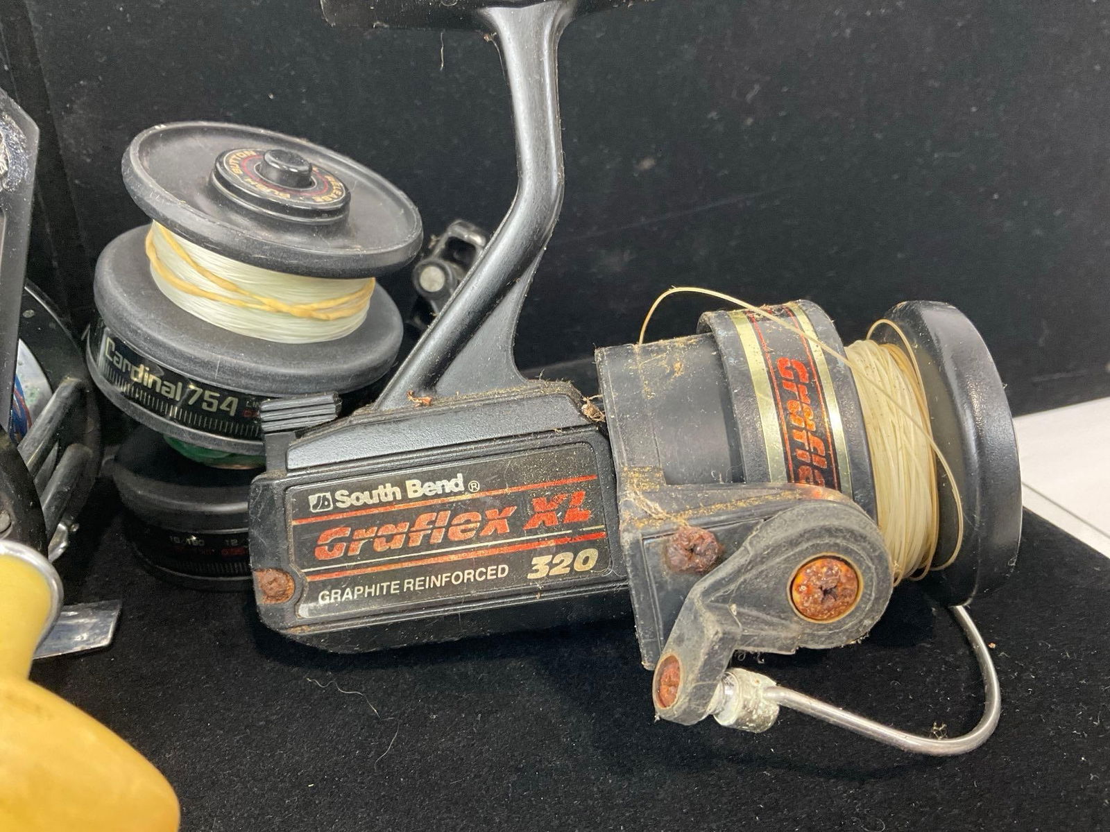South Bend Graflex XL, Ocean City 936 Fishing Reels, & Cardinal 754 w/ two more tops, 5h x 10w x 9d - 2