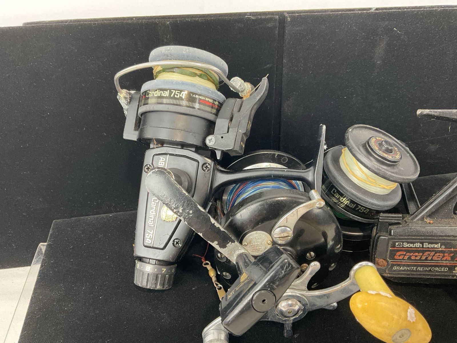 South Bend Graflex XL, Ocean City 936 Fishing Reels, & Cardinal 754 w/ two more tops, 5h x 10w x 9d - 3