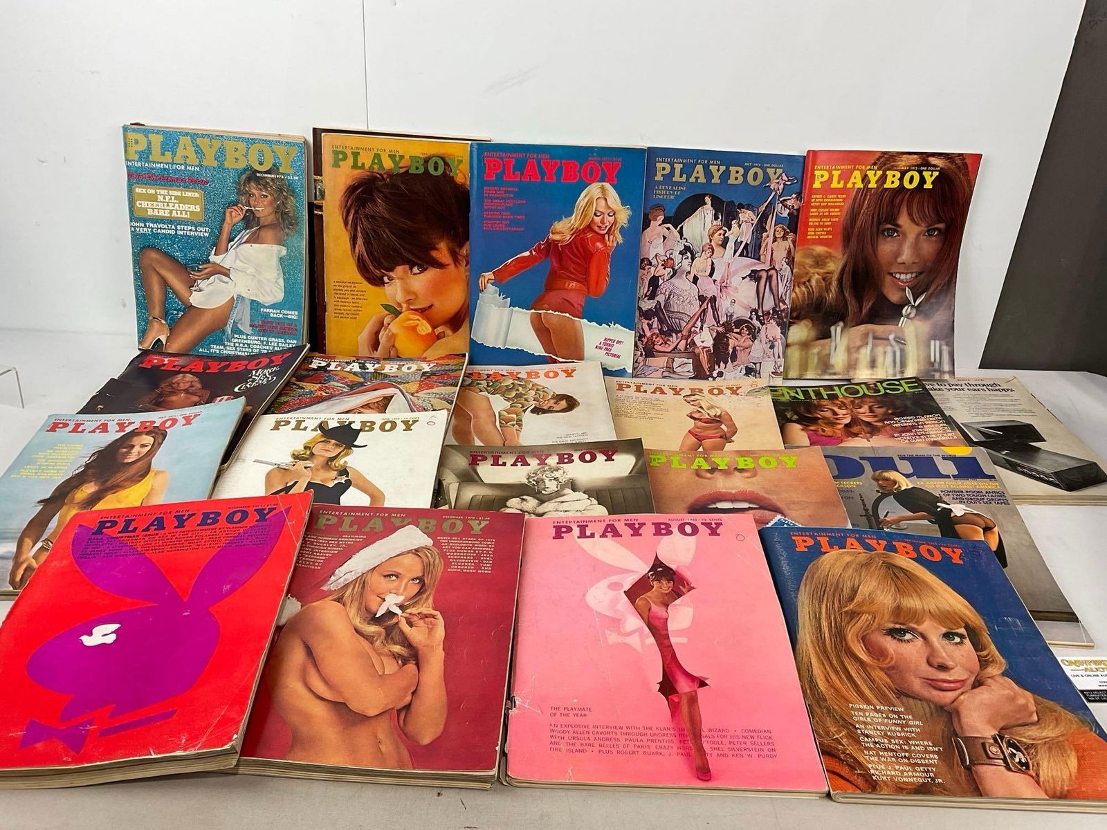 Vintage 1960s-70s Playboy & more Adult magazines, 20+ issues, some wear from age: Appears to be in fair to good shape. The piece measures approx inches. See pics. E-4880 *Oversized shipping may apply* 