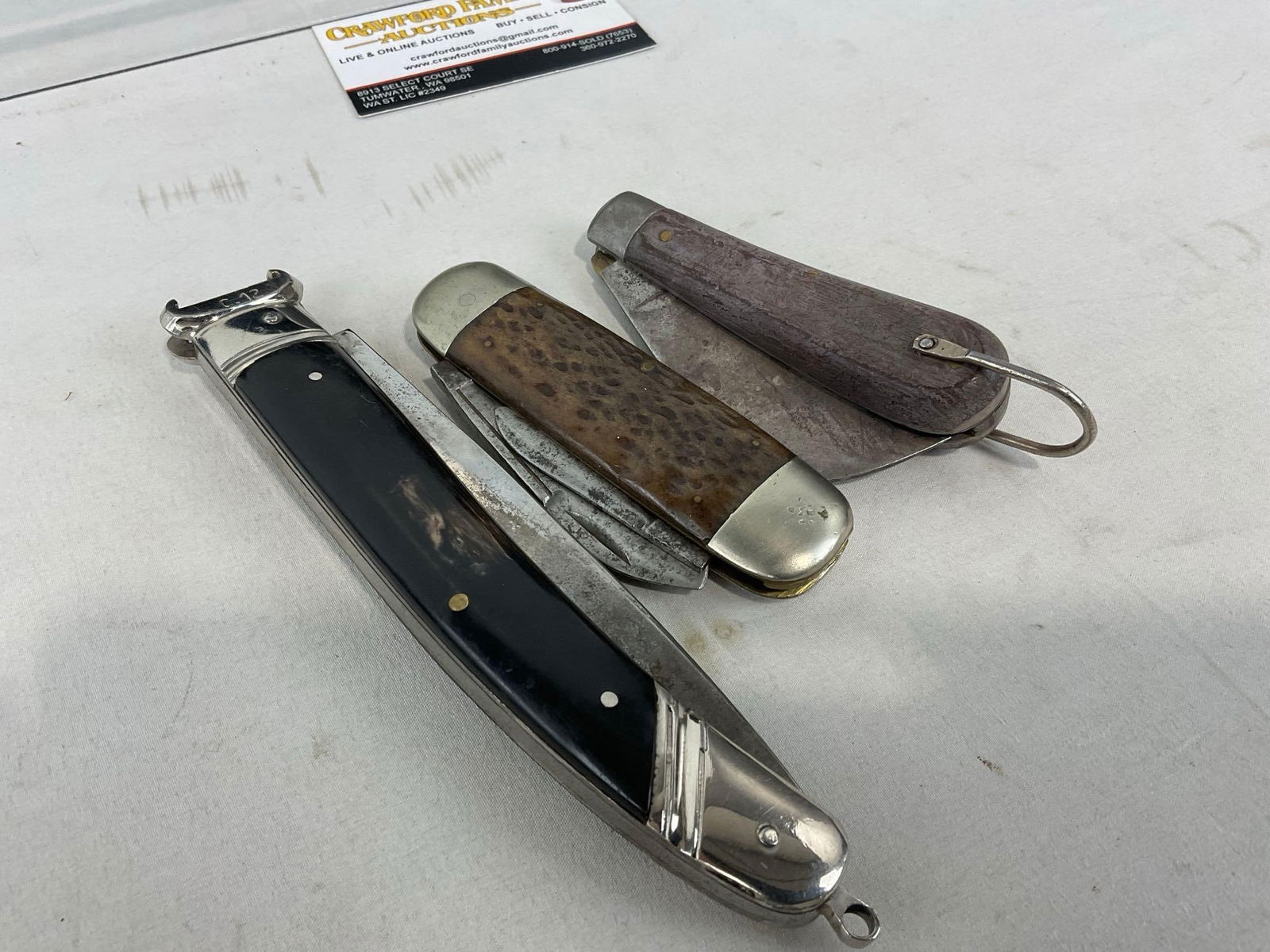 3 Folding Knives, Stiletto & M.Klein & Sons, & Large Aquila piece, w/ Shot Shell Extractor fins - 5
