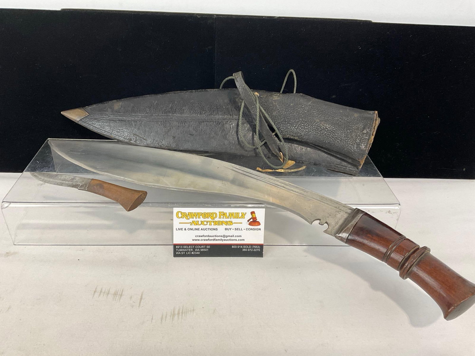 Vintage Kukri Knife in Leather Sheath, Mini Knife included, 20h x 4w x 4d inches: Appears to be in good shape. The piece measures approx 20h x 4w x 4d inches. See pics. E-5360 
