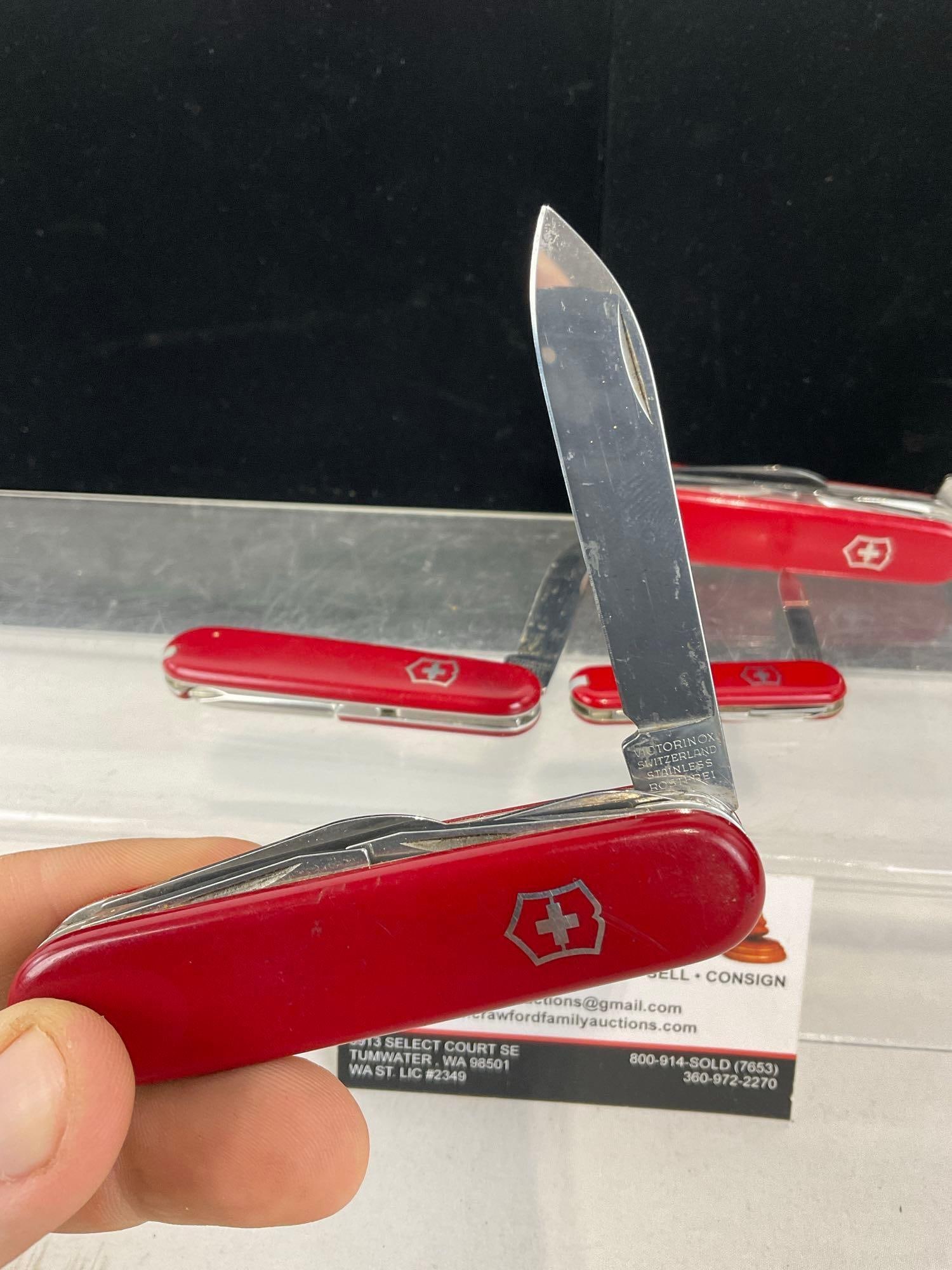 4 Victorinox Swiss Army Knives, 2 Rambler style, Mini Champ, & Huntsman - 2