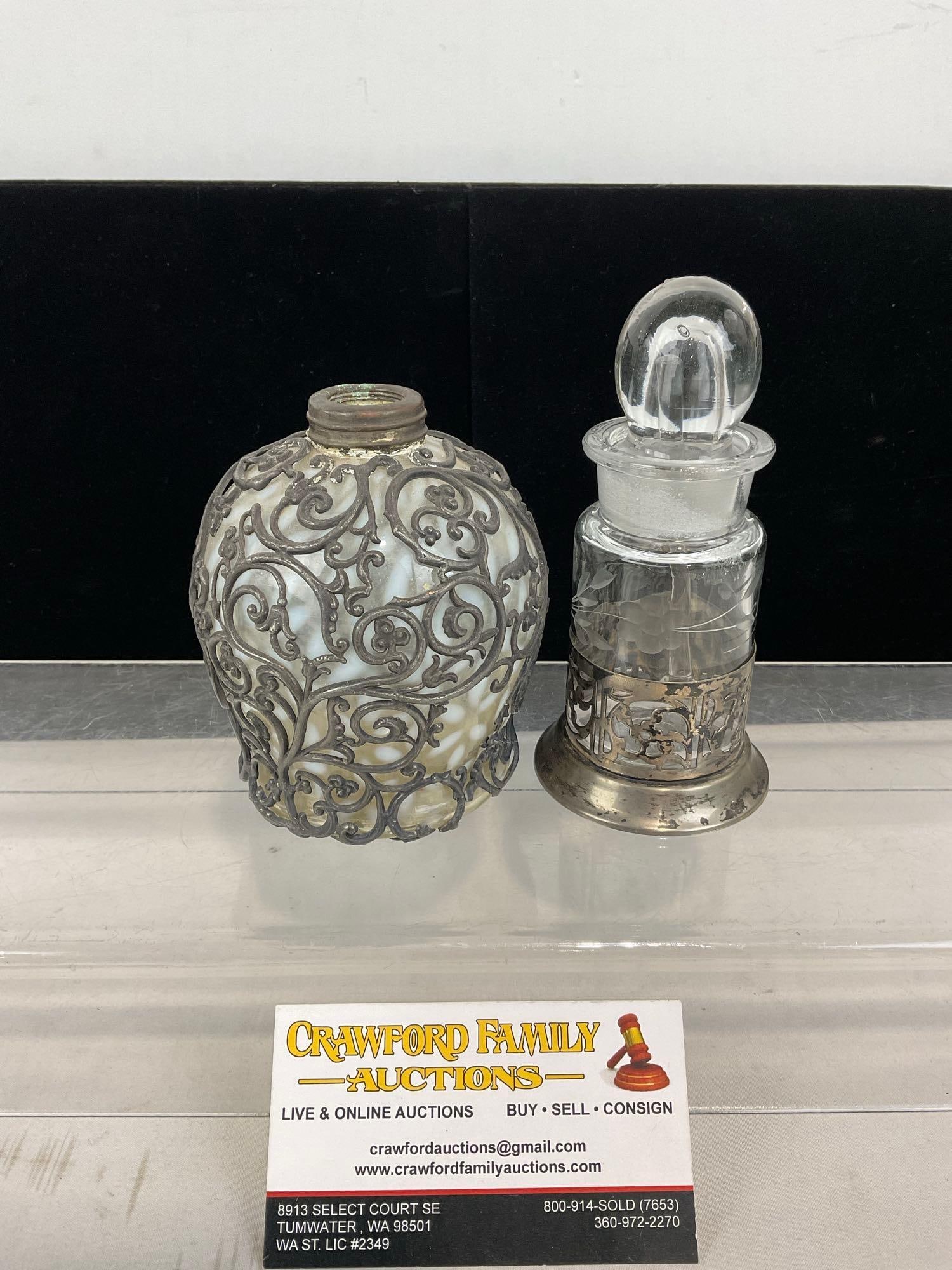 Perfume Bottle w/ Spoon & Silver Plate Holder & Bottle w/ Overlaid Pewter Scrollwork Pattern: Appears to be in good shape. The pieces measures approx 6h x 6w x 4d inches. See pics. E-5440 