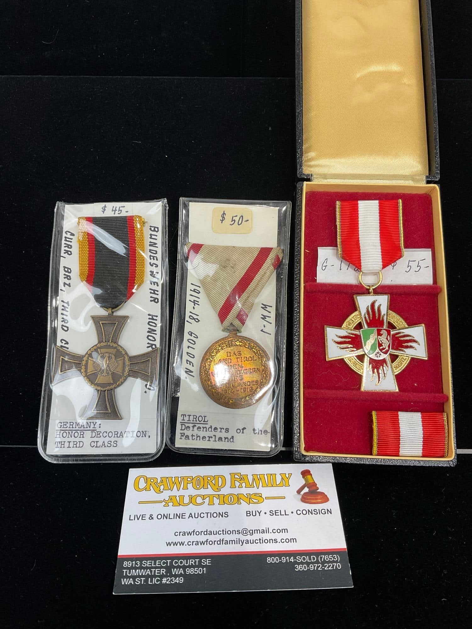 German Honor Deco. 3rd Class, Tirol Def. of the Fatherland & Nordrhein-Westfalen Firefighter Medal: All from a single collection, these are briefly described on the tag and were kept in a display. They measure approx 6h x 3w x 2d inches. See pics. E-5300 