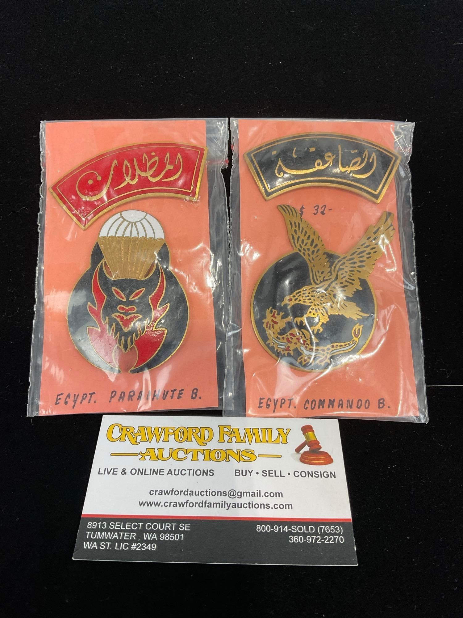 2 Large Egyptian Badges, Parachute & Commando, Bronze w/ Black & Red Enamel: All from a single collection, these are briefly described on the tag and were kept in a display. They measure approx 6h x 3w x 2d inches. See pics. E-5300 