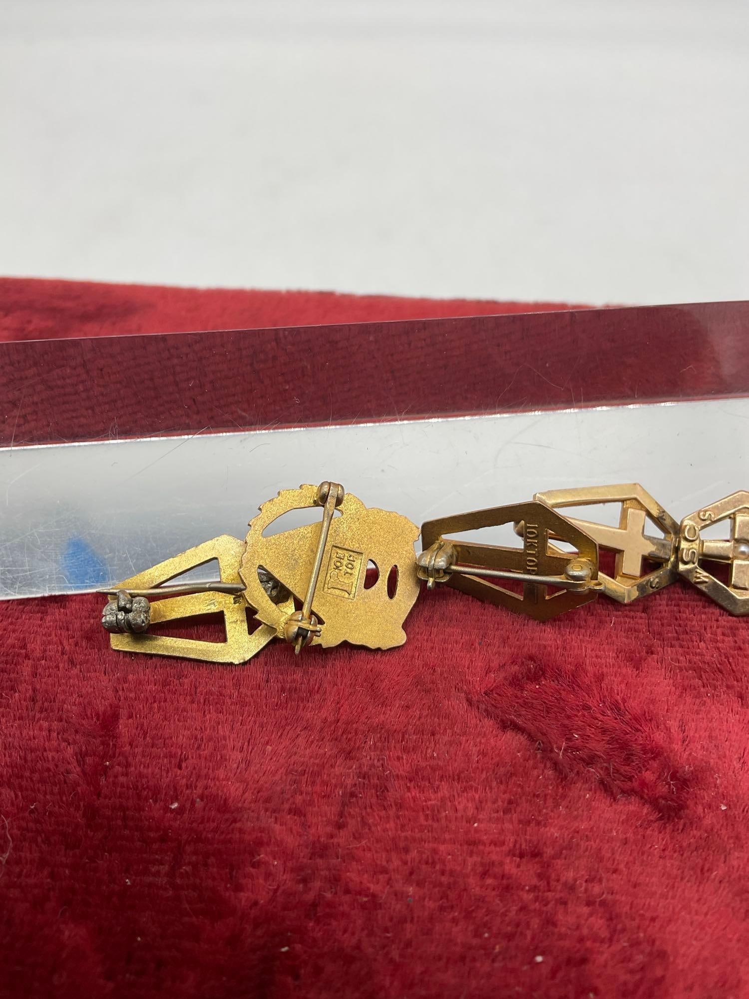 5x10K gold religious pins Marked 10K Gold top see pics Total Weight is10.68 grams - 4