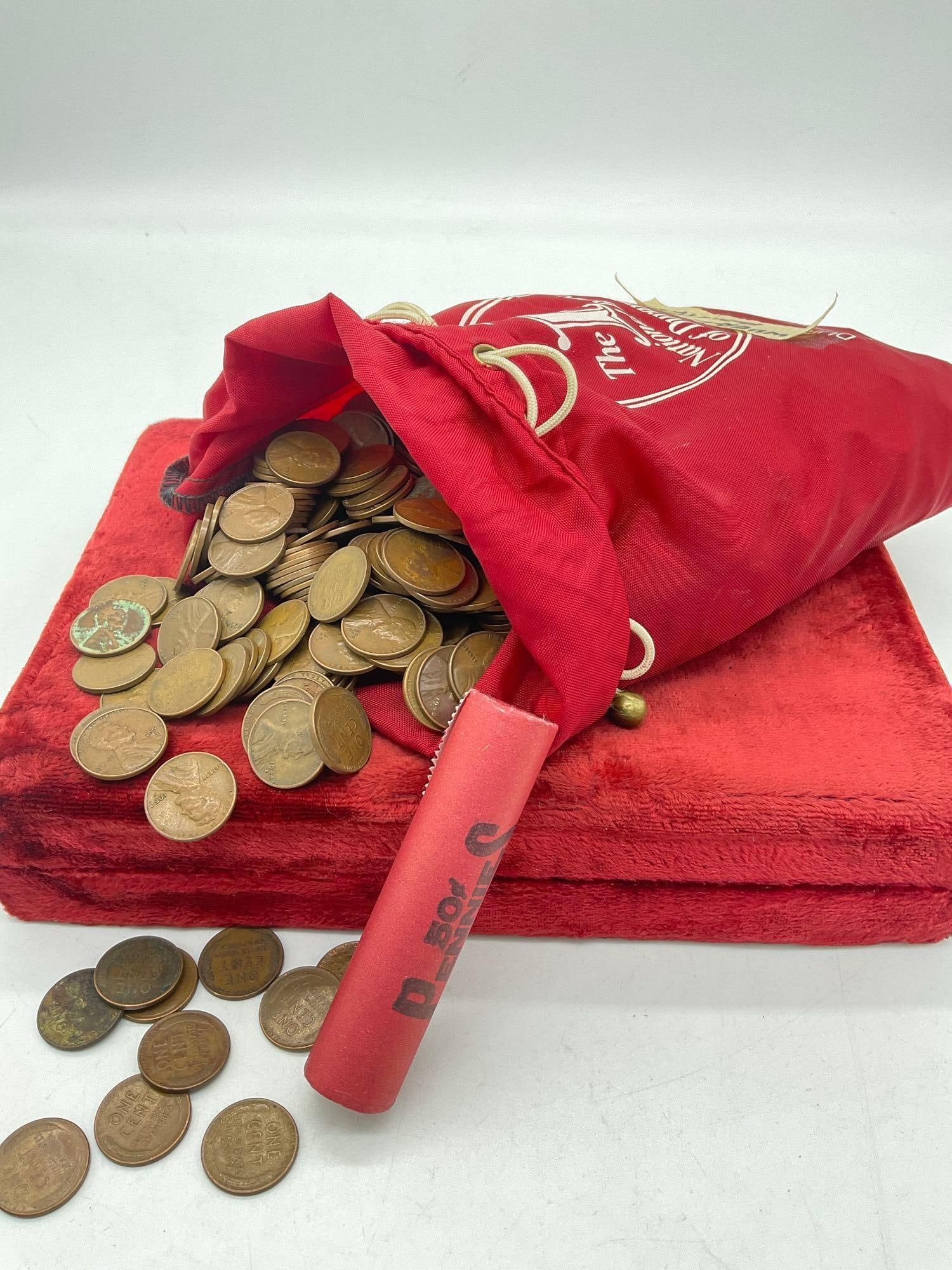8 to 9 pound bag of wheat pennies + sealed vintage Bank Roll of Copper Memorial pennies: c-5010 Large bag of wheat pennies w/ vintage bank bag The Bank rolled pennies Look like they could be UNC and the end roll coin has a date of 1966