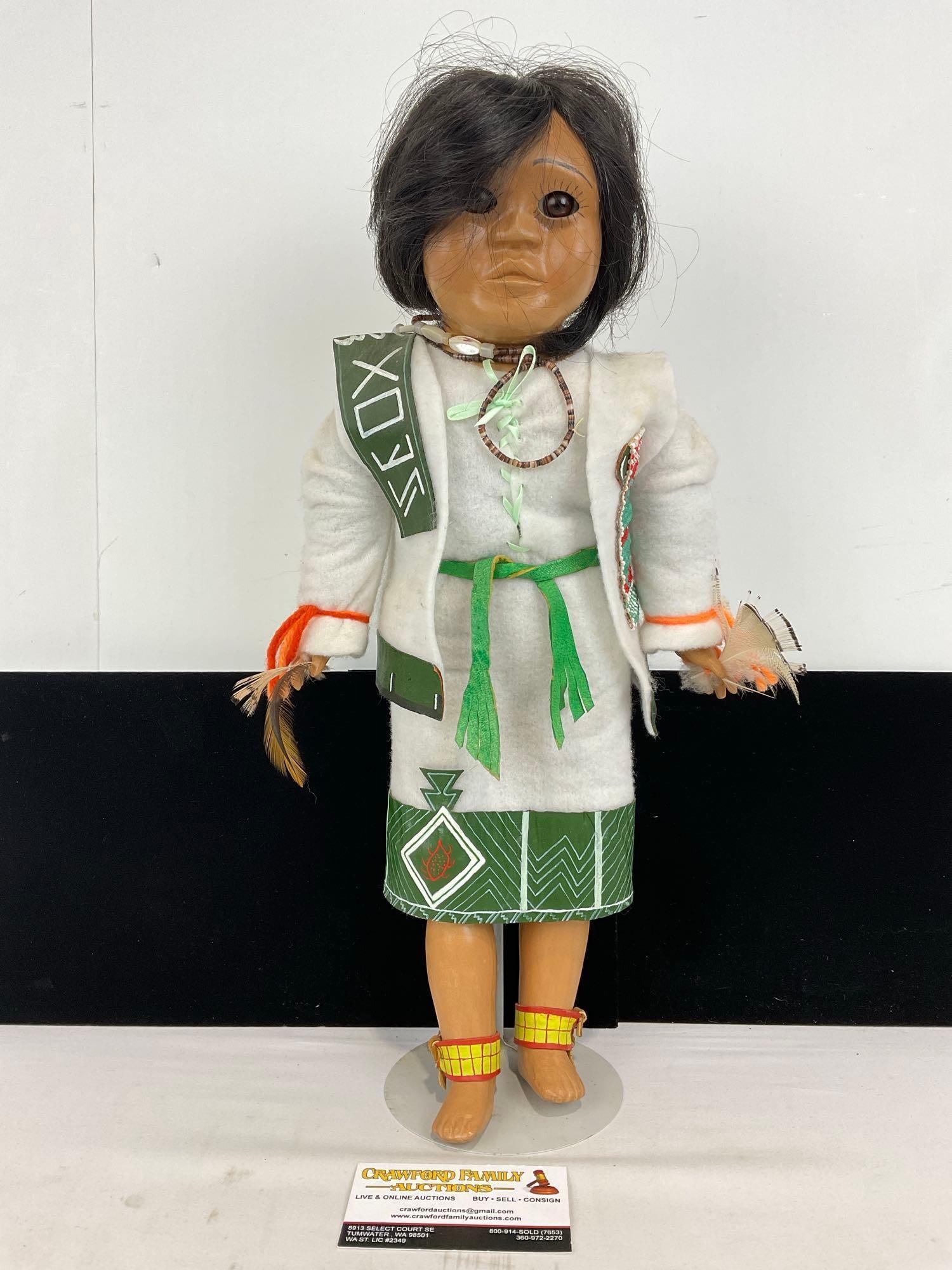 Handmade Native American Doll, Ornate Green/White Clothes, w/intricate beadwork, 19x9x5 inches: Similar to the next doll. Appears to be in good shape. The piece measures approx 19h x 9w x 5d inches. See pics. E-5320 