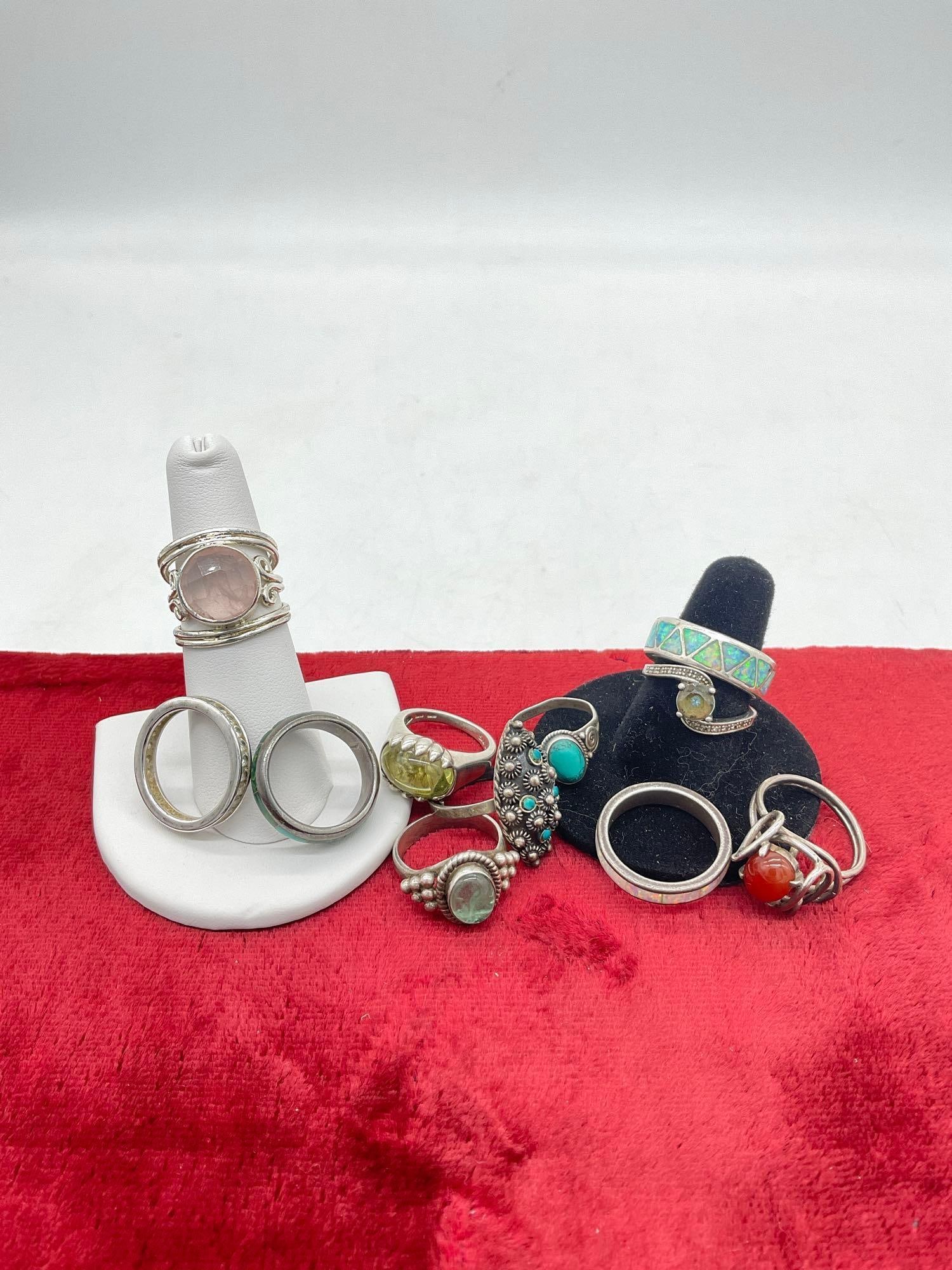 Fine selection of 11 sterling silver rings in various styles w/ crystal & stone settings: JC-1554 