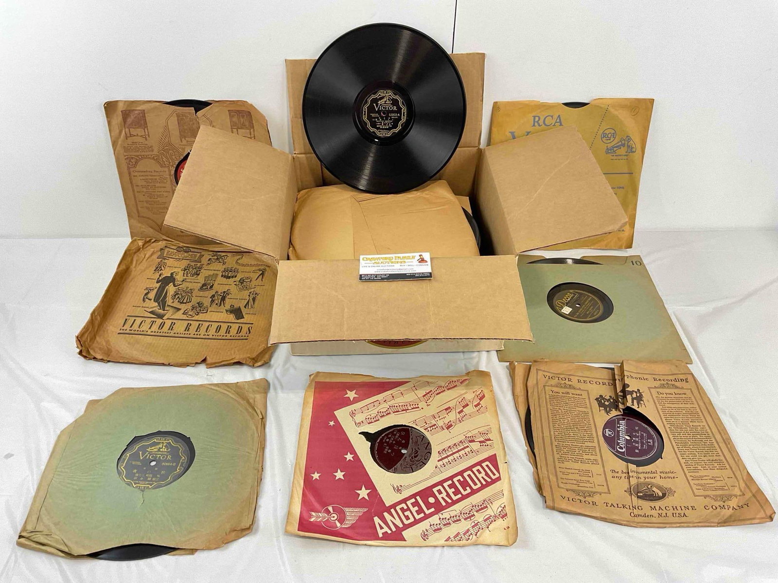 30+ pcs Vintage Vinyl Record Music Album Collection, incl. Nipponophone, Angel Record & More!: 30+ pcs Vintage Vinyl Record Music Album Collection, incl. Nipponophone, Angel Record & More! Minor wear indicative of age, not all sleeves have been checked, condition as is. Fits in box measurin