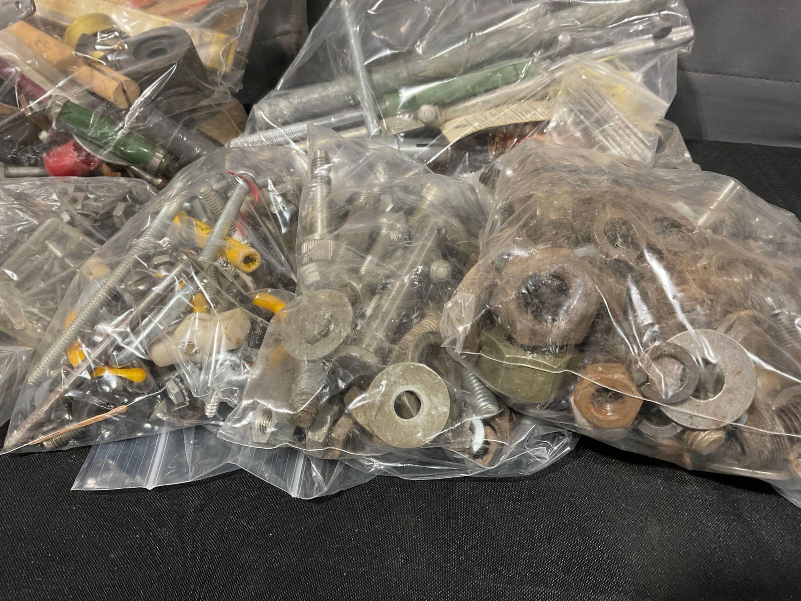 assorted nuts, bolts, and other fasteners, in bags, uncounted - 4