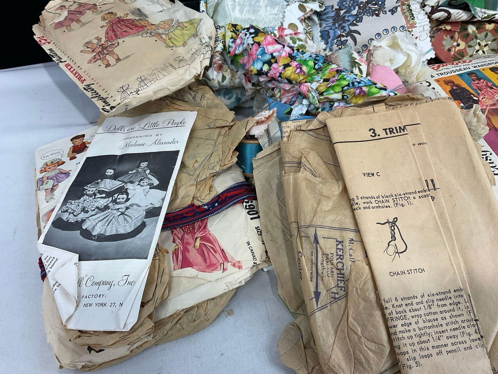 Assortment of Fabrics, Doll Clothing Instructions, The Trio Tress Wig Fall & more - 2