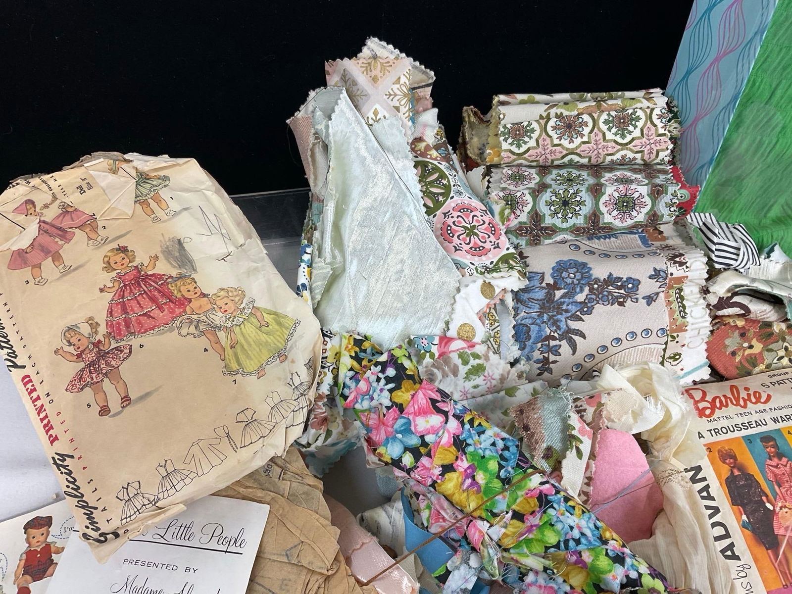 Assortment of Fabrics, Doll Clothing Instructions, The Trio Tress Wig Fall & more - 3