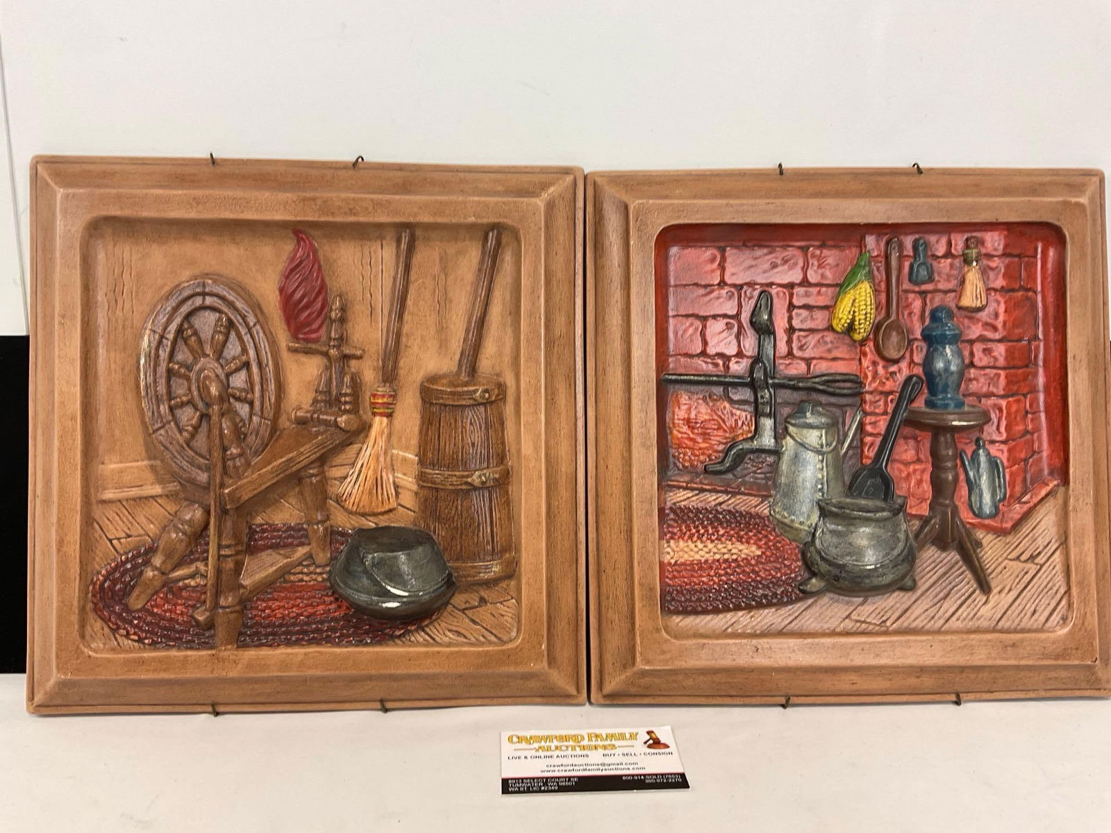 Pair of Chalkware Wall Plaques, Spinning Wheel & Fireplace Scene, 12h x 12w x 4d inches: Appears to be in good shape, some small signs of wear. The piece measures approx 12h x 12w x 4d inches. See pics. E-4870 
