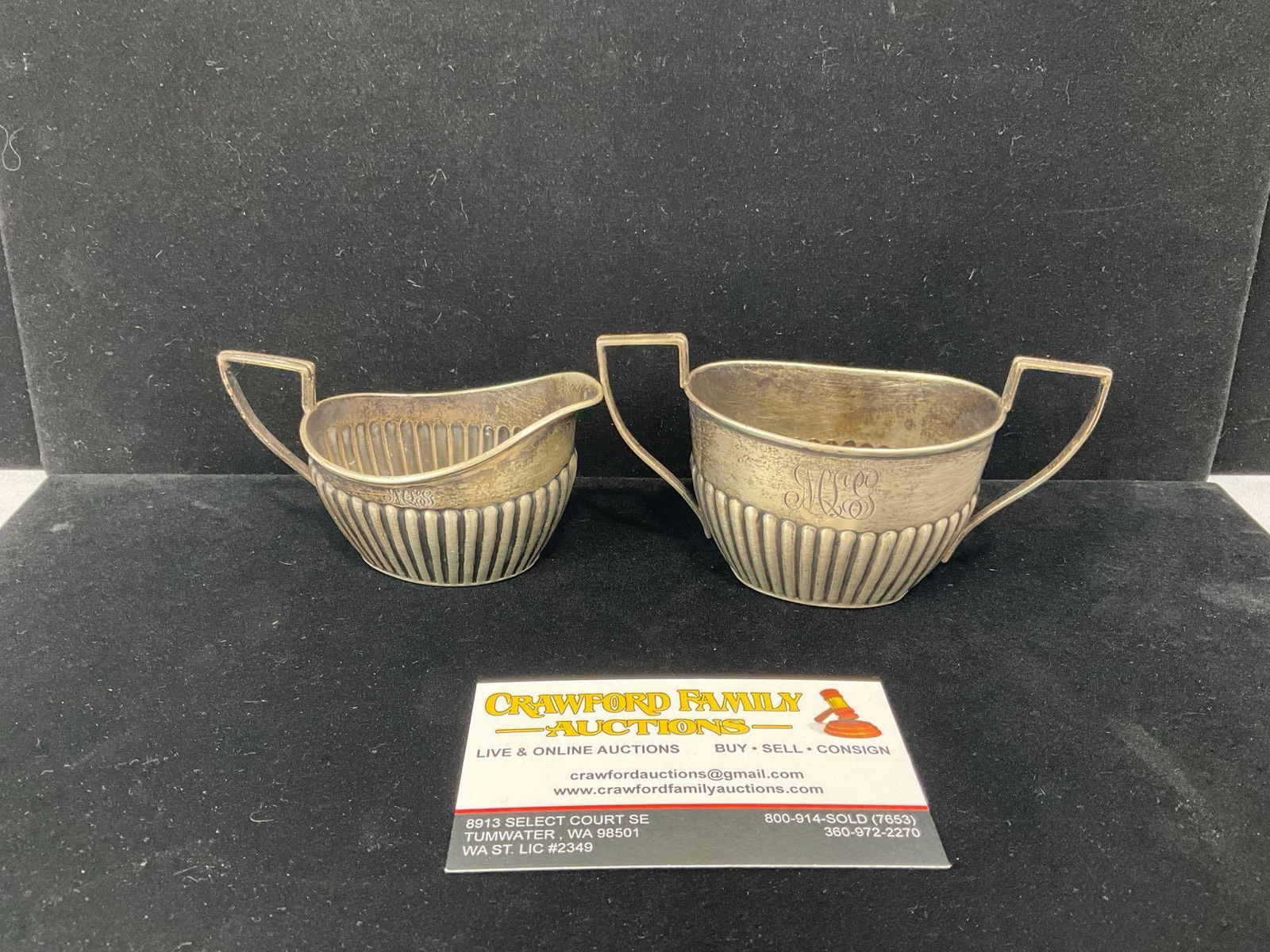 Pair of Sterling Silver Sugar Bowl & Creamer, weighs 80.6 Grams in total, lovely scalloped design: One marked 1/8 pint, A287, Sterling, the other Sterling A286. Appears to be in good shape, in total they weigh 80.6 grams, including any non silver portions. The piece measures approx 5h x 6w x 3d inc