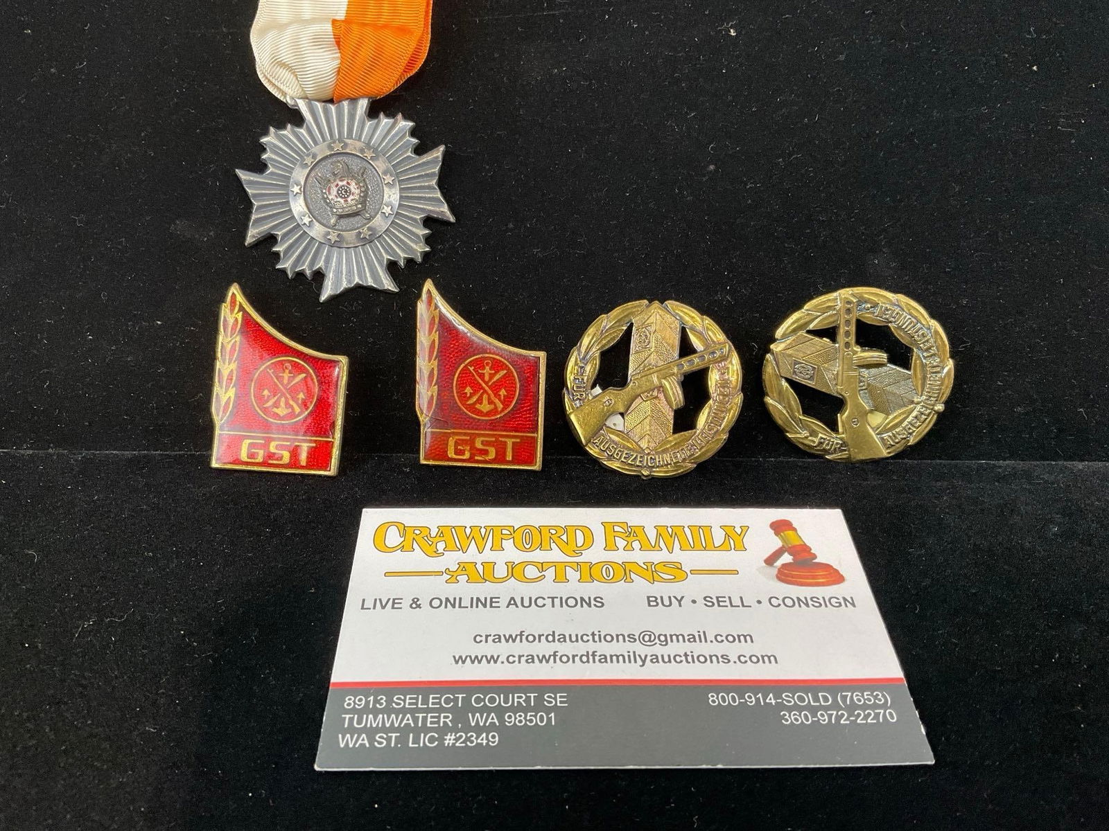 4 GDR East German pieces, 2 GST Pins, Border Troop Perf Badge & Masonic order DeMolay Medal: All from a single collection, these are briefly described on the tag and were kept in a display. They measure approx 6h x 3w x 2d inches. See pics. E-5300 