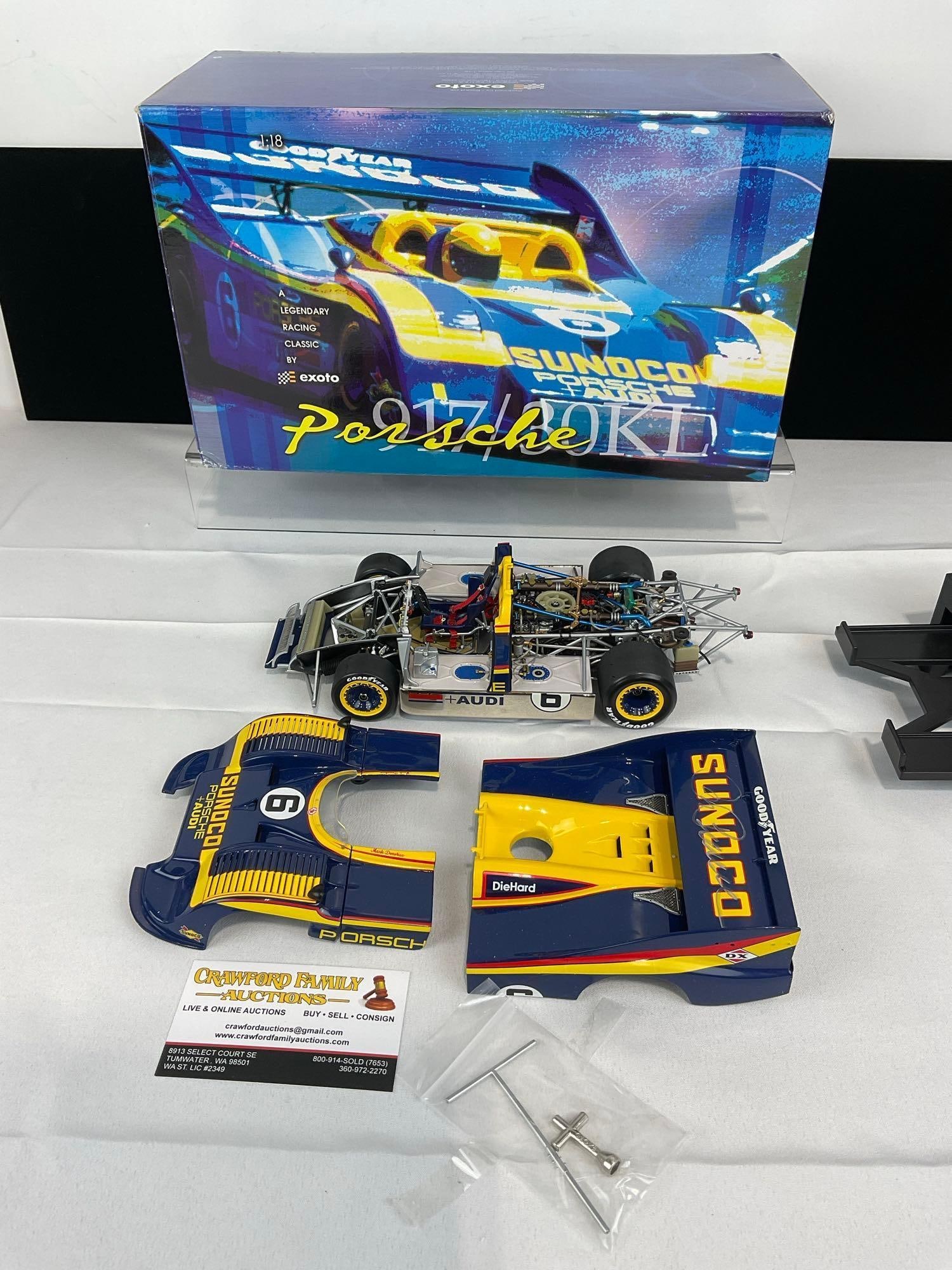 Exoto 1975 Porsche 917/30 #6 Sunoco 1/18 Scale Diecast Car Model orig box, Signed: The spoiler wing is signed, looks like it says ... Pearce. Appears to be in good shape. The piece measures approx 7h x 15w x 9d inches. See pics. E-5420 