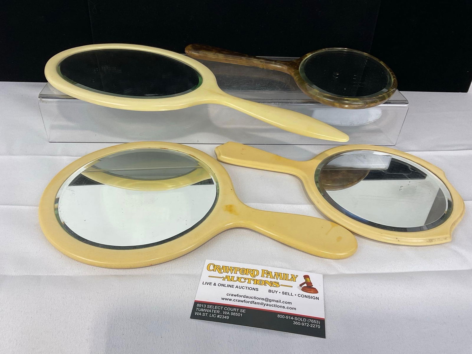 4 20th Century Vanity Mirrors, Bakelite/Celluloid in off-white color, 4 Beveled Glass Mirror: Appears to be in good shape. The piece measures approx 3h x 15w x 8d inches. See pics. E-5440