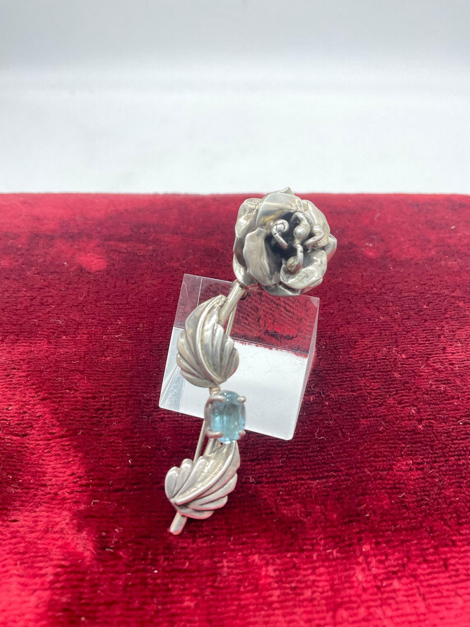 Vintage sterling silver 1987 Carol Felley floral brooch pin with blue topaz setting: Jc-5320 