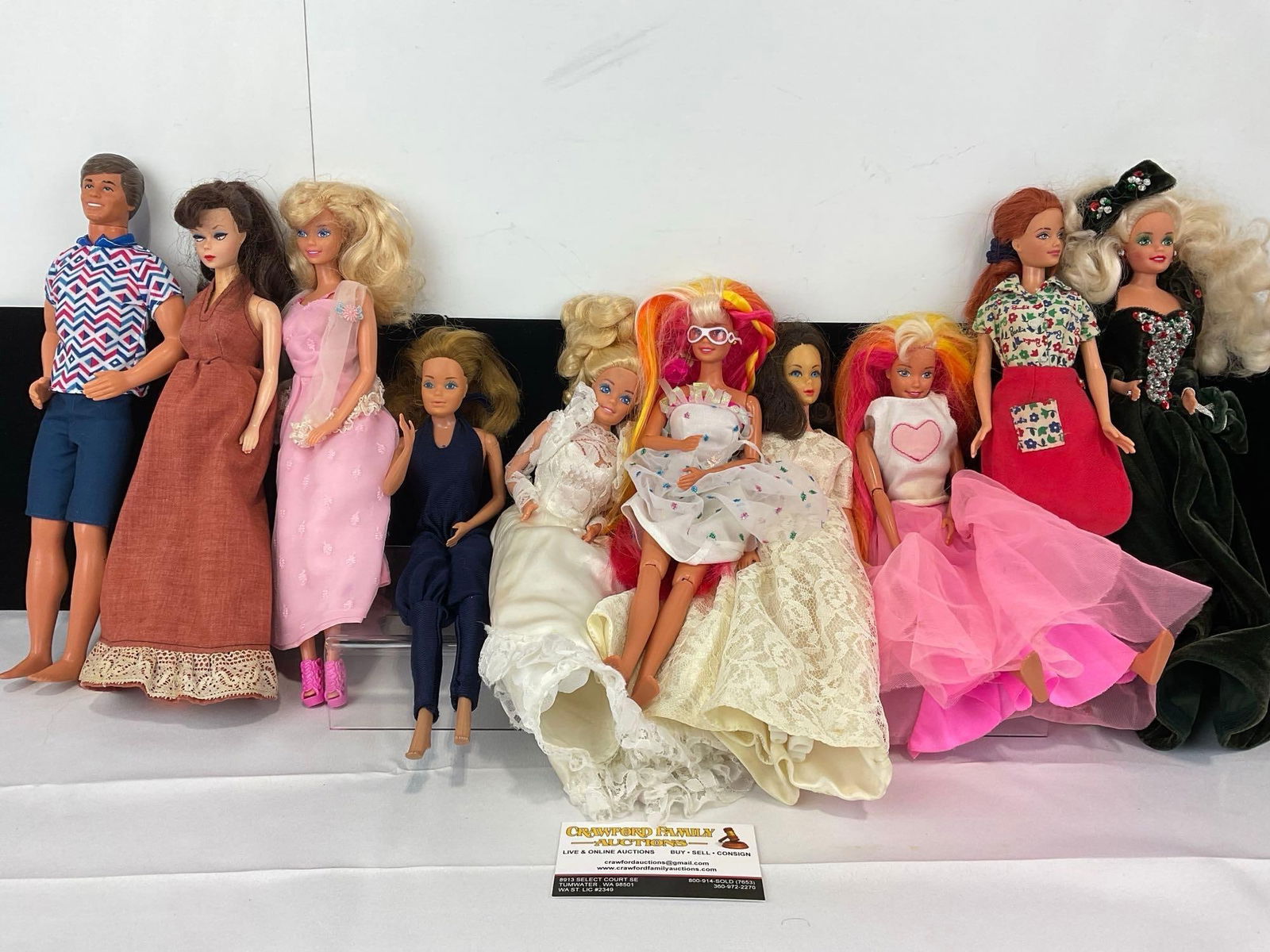 Set of 10 Barbie & Ken Dolls, from the 1970s, and more: Appears to be in good shape. The piece measures approx 11h x 13w x 10d inches. See pics. E-5430