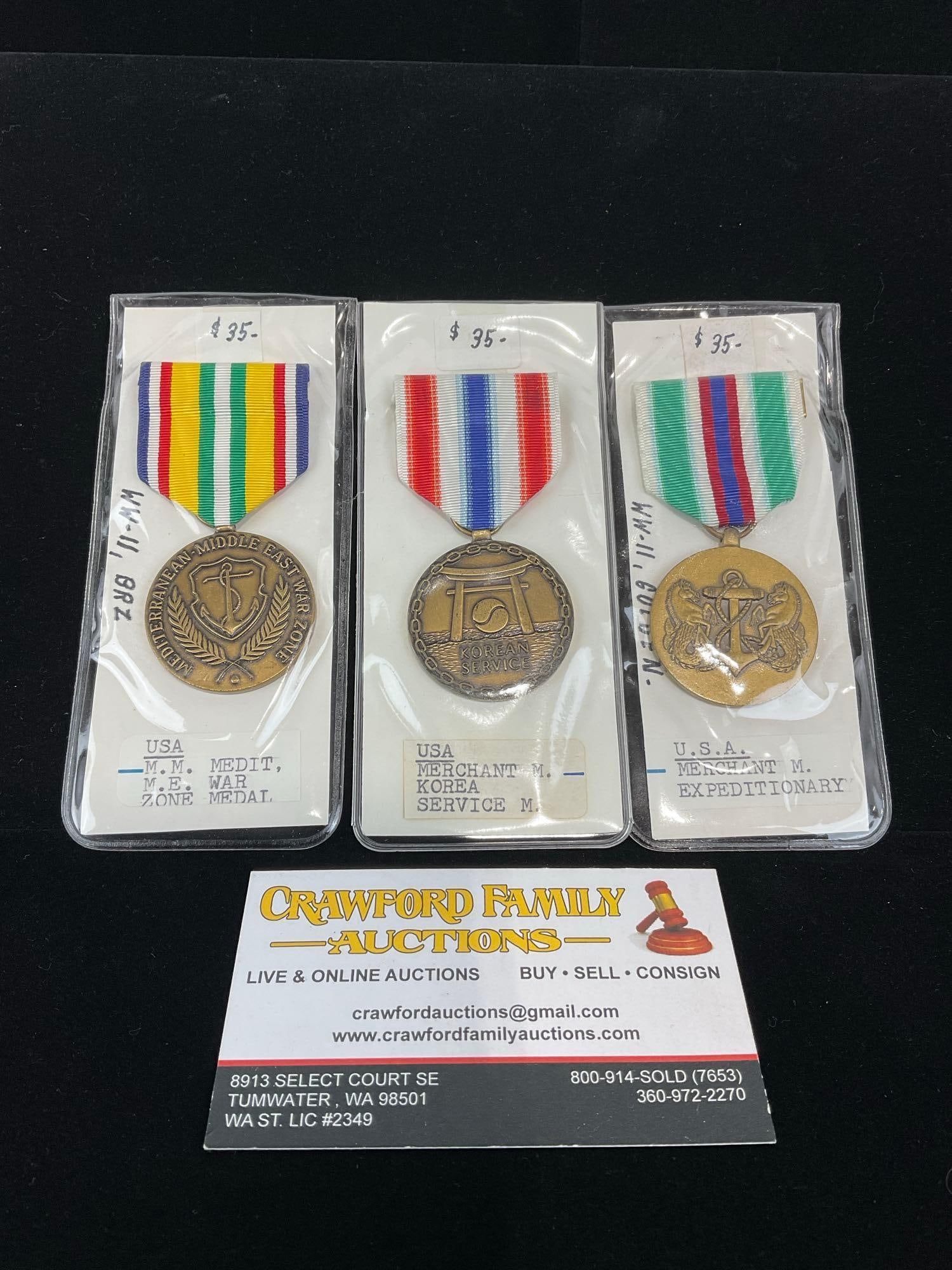 3 US Merchant Marines Medals, War Zone Medal, Korea Service & Expeditionary Medal: All from a single collection, these are briefly described on the tag and were kept in a display. They measure approx 6h x 3w x 2d inches. See pics. E-5300