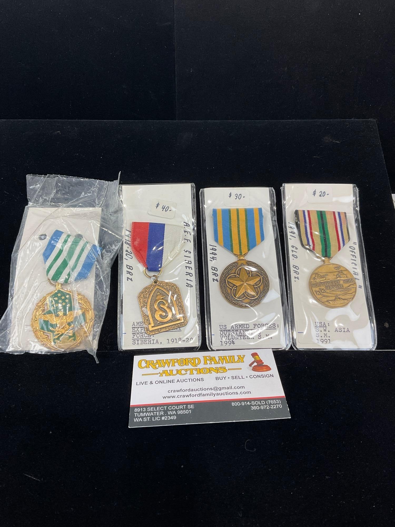 4 US Armed Forces Medals, Outstanding Vol., SW Asia Serv 1991, Exped. Force Siberia & Joint Service: All from a single collection, these are briefly described on the tag and were kept in a display. They measure approx 6h x 3w x 2d inches. See pics. E-5300