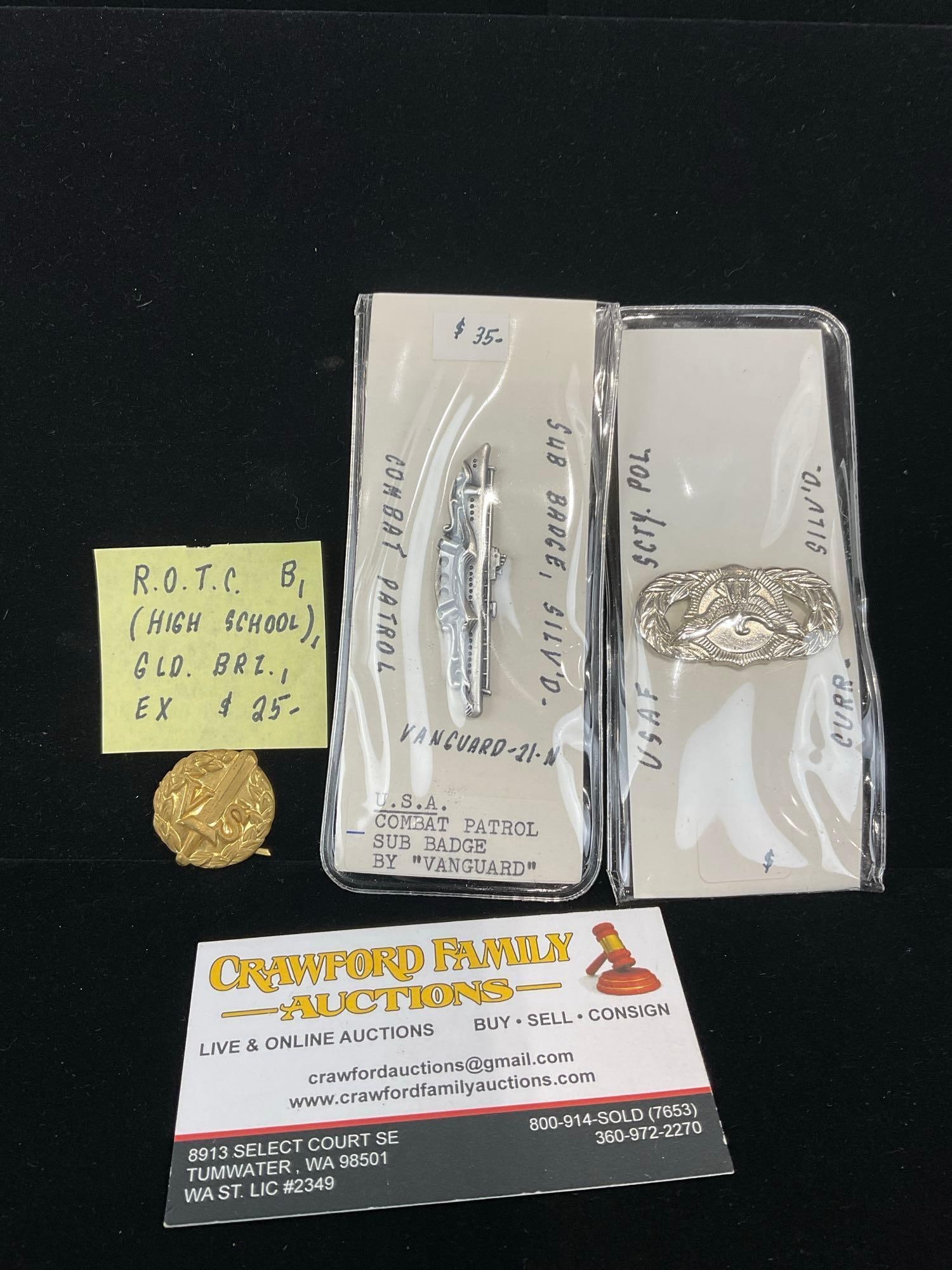 3 Badges, ROTC Badge High School Gilt Bronze, US Combat Patrol Sub Badge & USAF Security Police: All from a single collection, these are briefly described on the tag and were kept in a display. They measure approx 6h x 3w x 2d inches. See pics. E-5300 