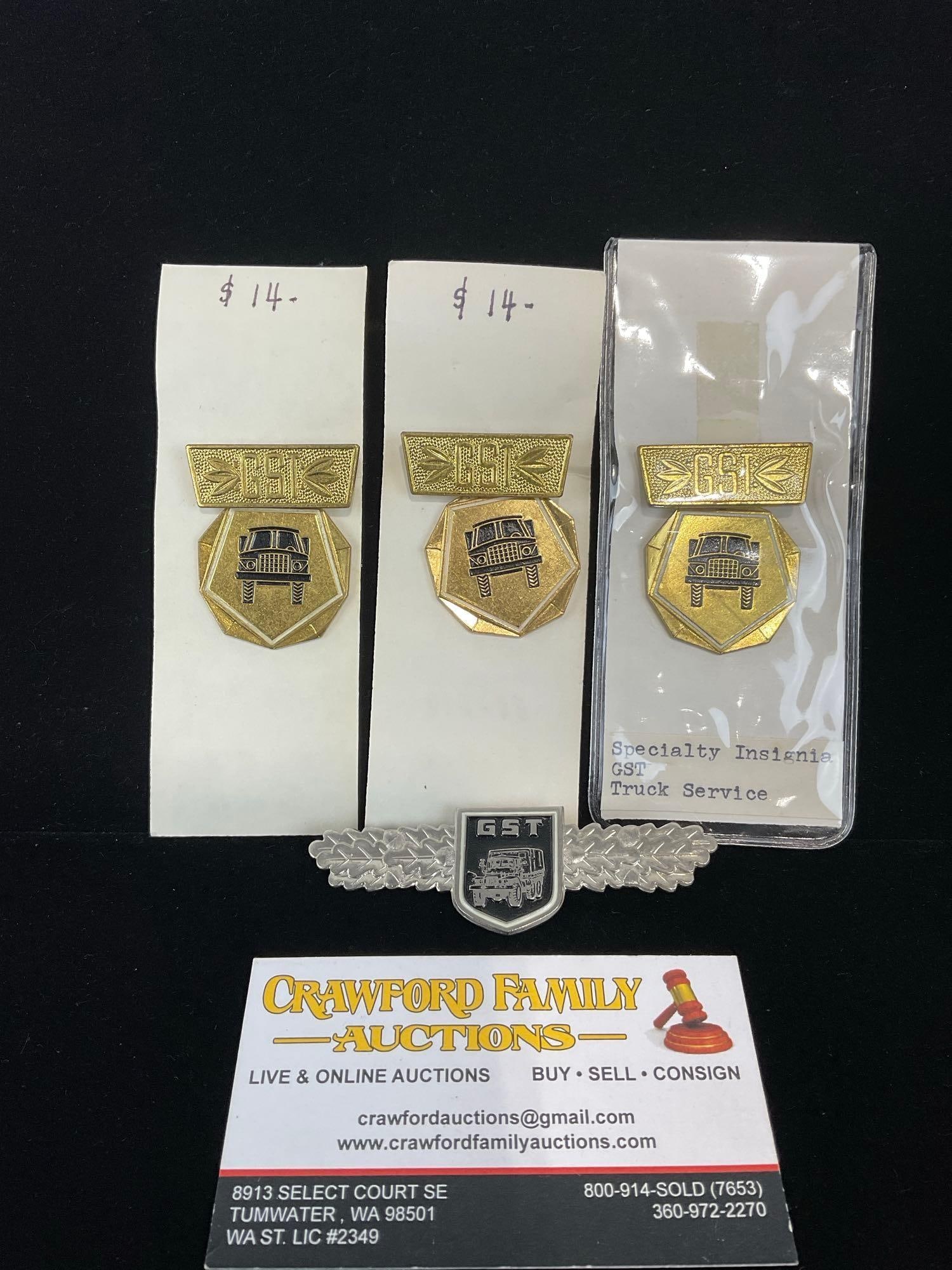 4 GDR East German Class. Badge & Specialty Insignia GST Truck Service: All from a single collection, these are briefly described on the tag and were kept in a display. They measure approx 6h x 3w x 2d inches. See pics. E-5300 