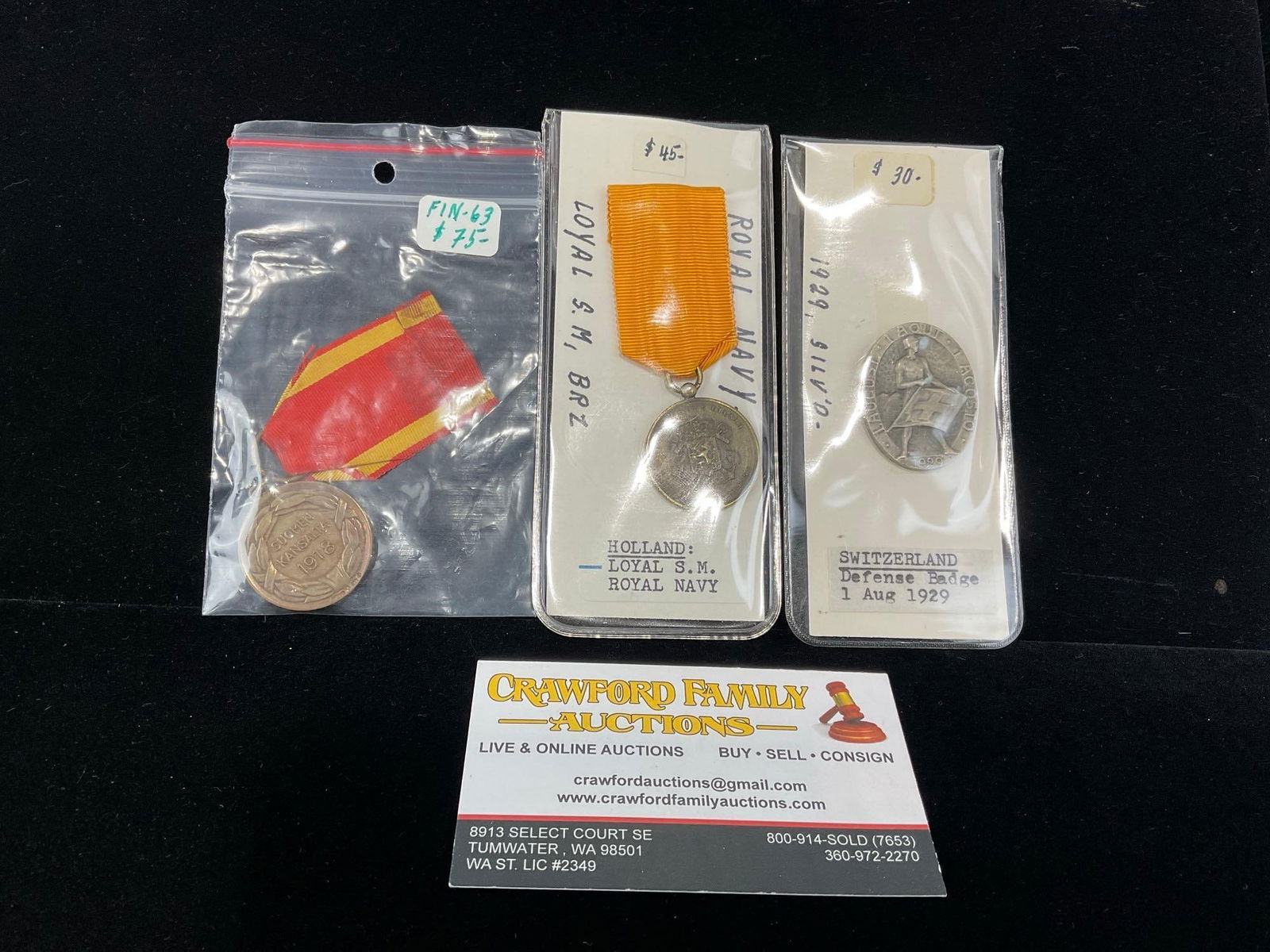 Holland Loyal Service Medal Royal Navy, Swiss Defense Badge 1929 & Finnish 1918 Medal of Liberty: All from a single collection, these are briefly described on the tag and were kept in a display. They measure approx 6h x 3w x 2d inches. See pics. E-5300