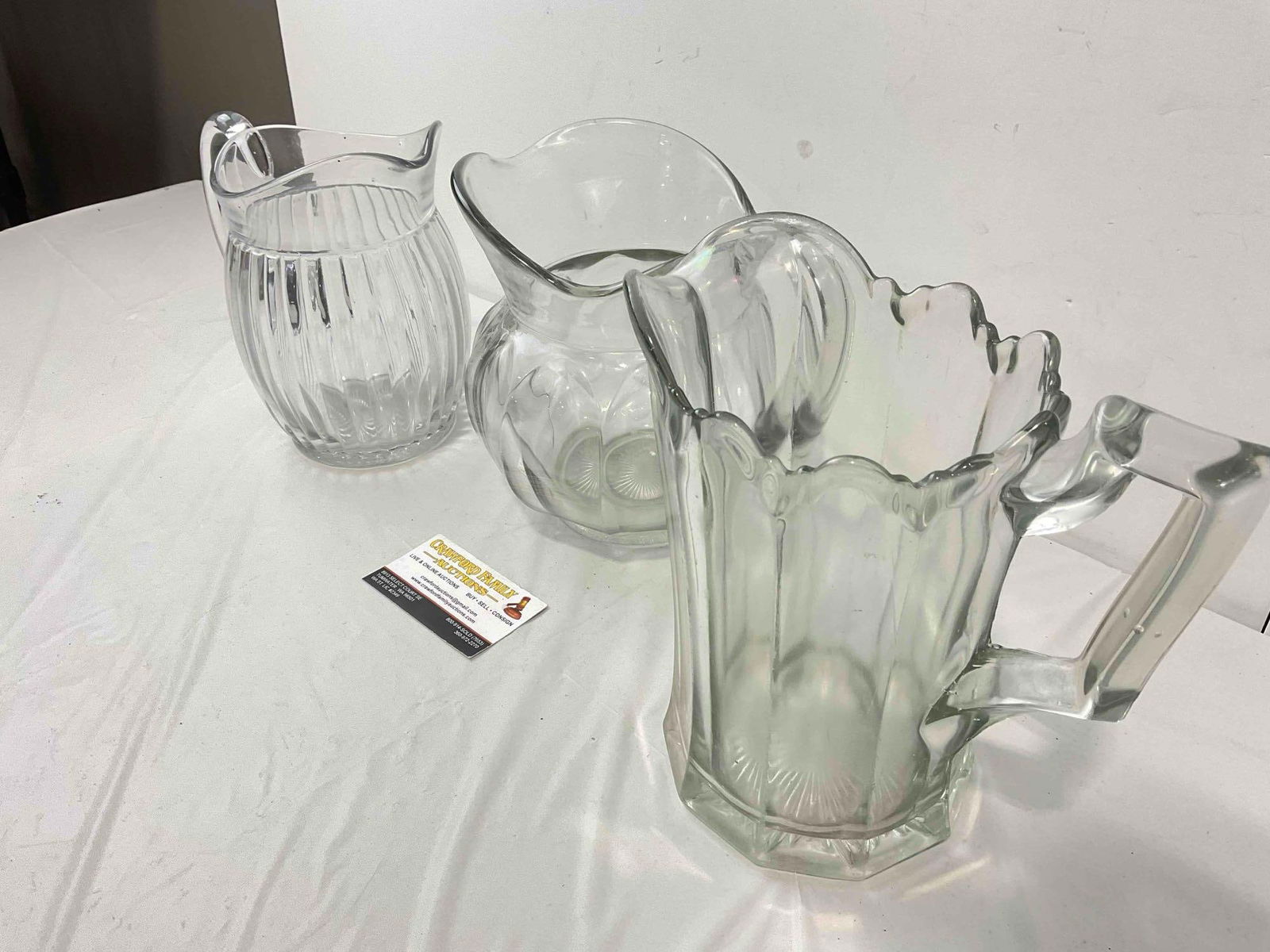 3 pcs Vintage Clear Glass Water Pitchers. Very Good Condition. Measures 9" x 5" x 9" See pics. - 2