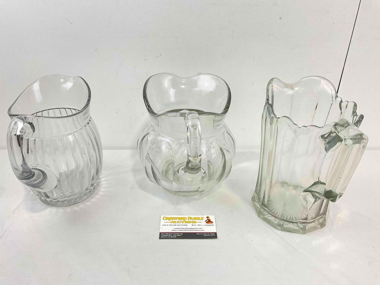 3 pcs Vintage Clear Glass Water Pitchers. Very Good Condition. Measures 9" x 5" x 9" See pics. - 4