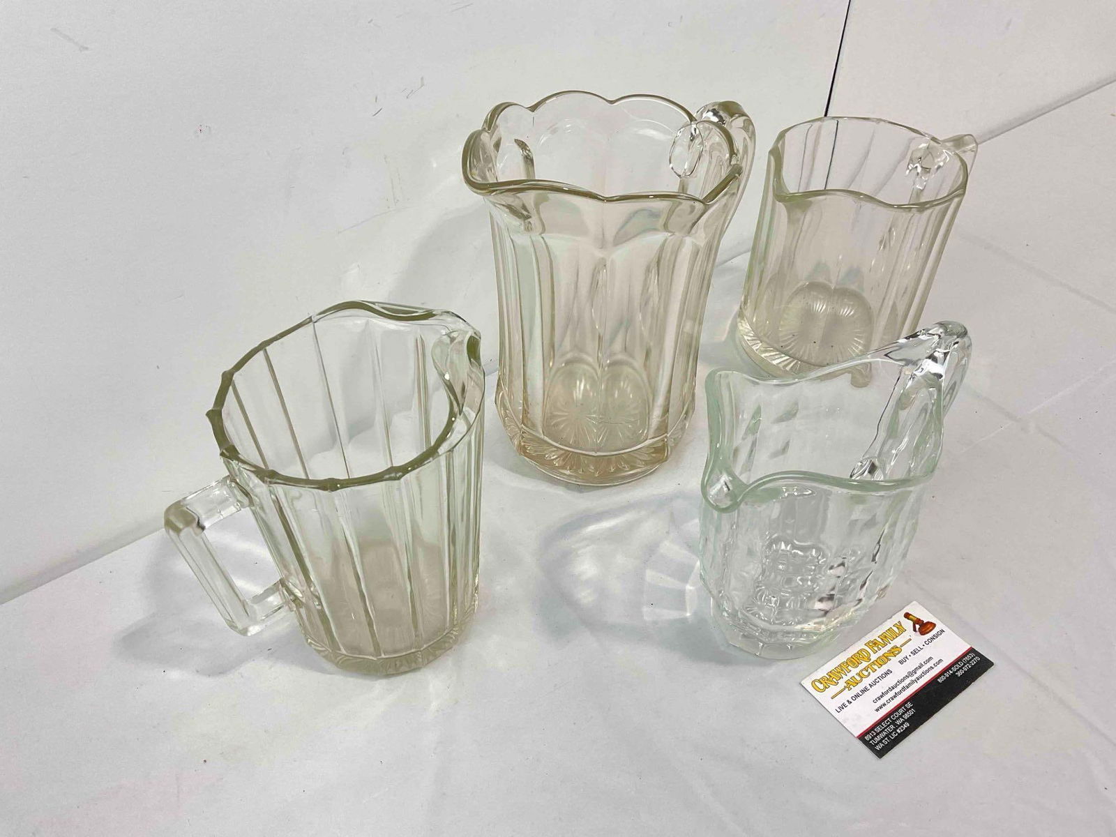 4 pcs Vintage Clear Glass Water Pitchers. Very Good Condition. Measures 8" x 5" x 8" see pics. - 3