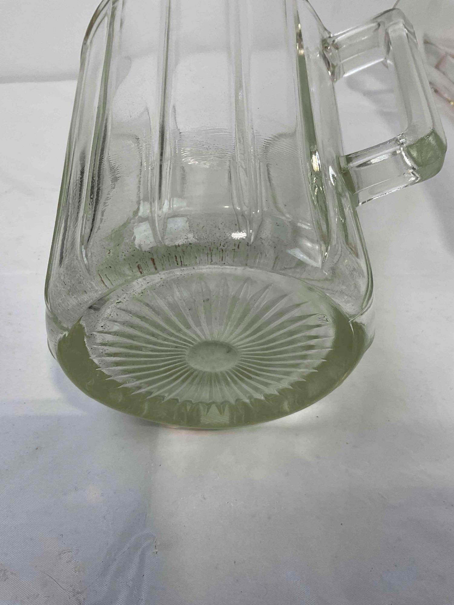 4 pcs Vintage Clear Glass Water Pitchers. Very Good Condition. Measures 8" x 5" x 8" see pics. - 6