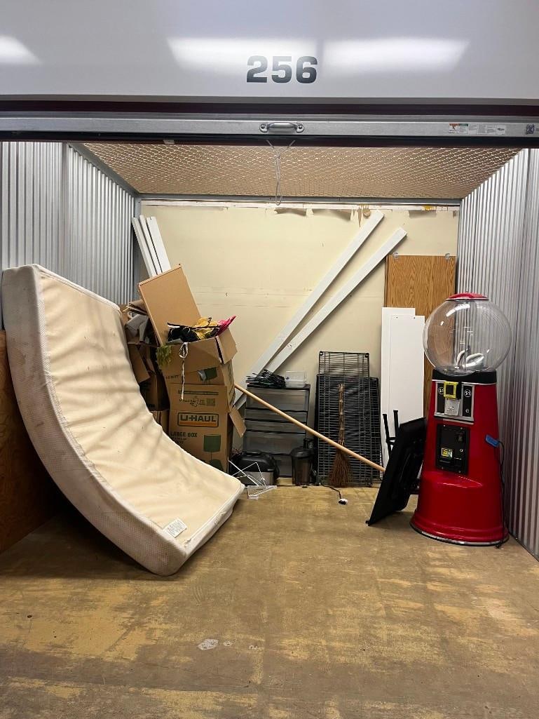 Unit # 256 (10x10) Large Gumball machine, dog crate, flat screen tv, air fryer, and juicer (1 of 3)
