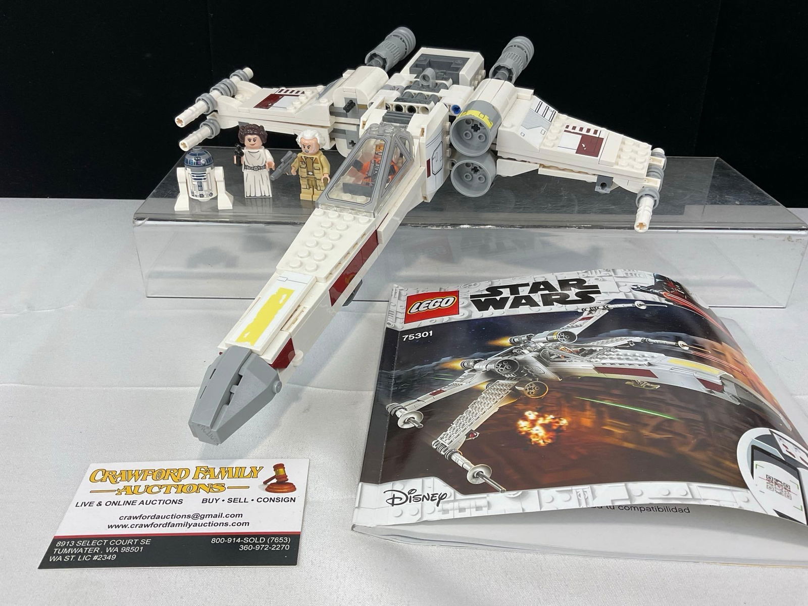 Lego Star Wars X Wing Fighter, #75301, incomplete, w/4 mini figs, & manual: Appears to be in fair to good shape, missing some pieces for the set. The piece measures approx 5h x 14w x 8d inches. See pics. E-5180