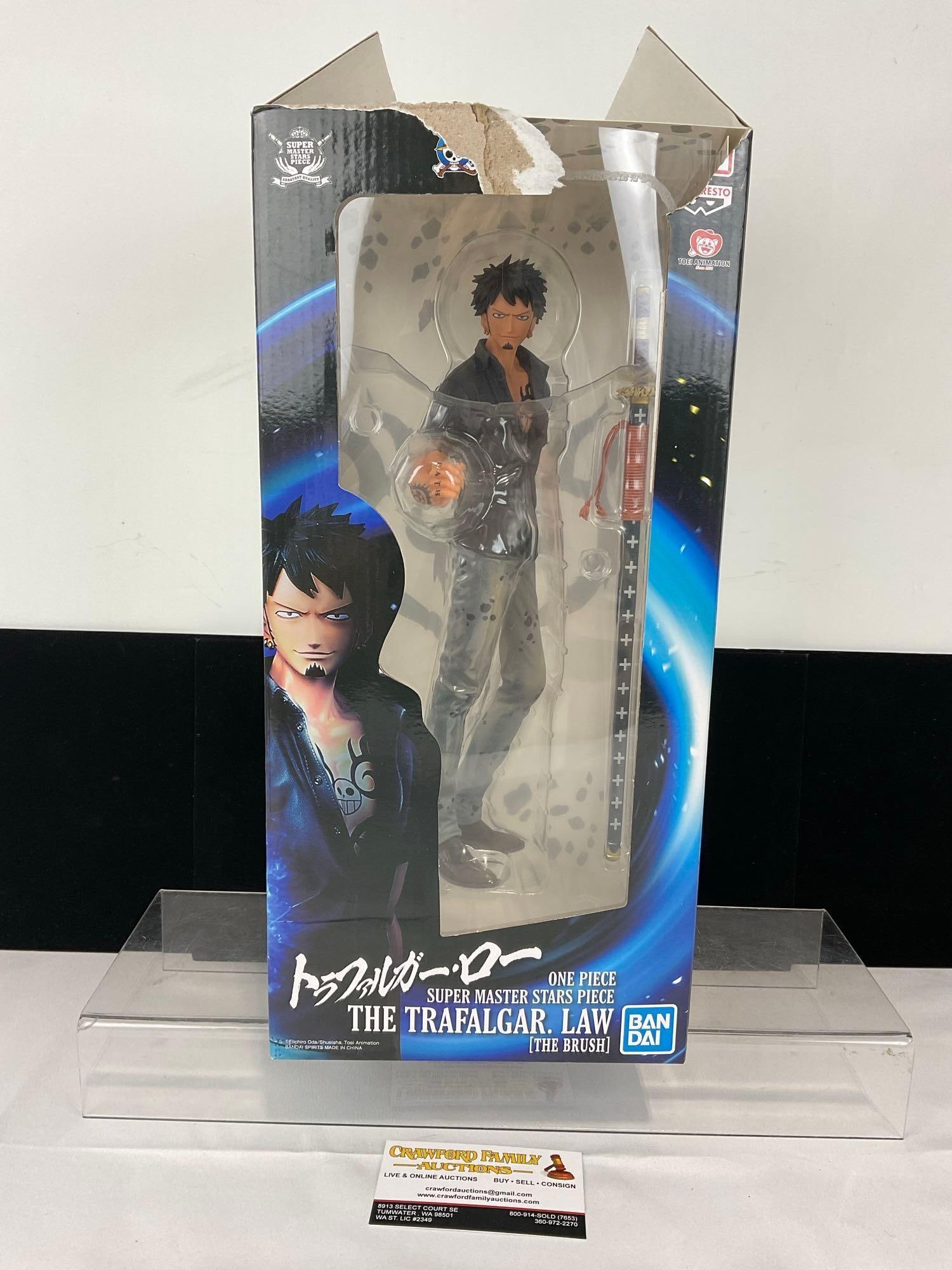 One Piece Super Master Stars The Trafalgar Law Vinyl Figure, Anime Display piece 12 inch w/box: Appears to be in fair to good shape, has been opened, and the top flap is torn off of the box. The piece measures approx 16h x 8w x 8d inches. See pics. E-5180 
